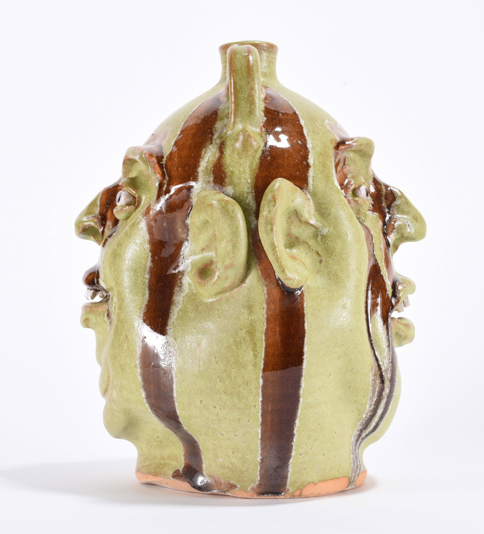 Marvin Bailey Double Face Jug: 11" - an incredible face jug with two faces by Marvin Bailey with very dramatic runs. China plate teeth on both sides. Signed on bottom.