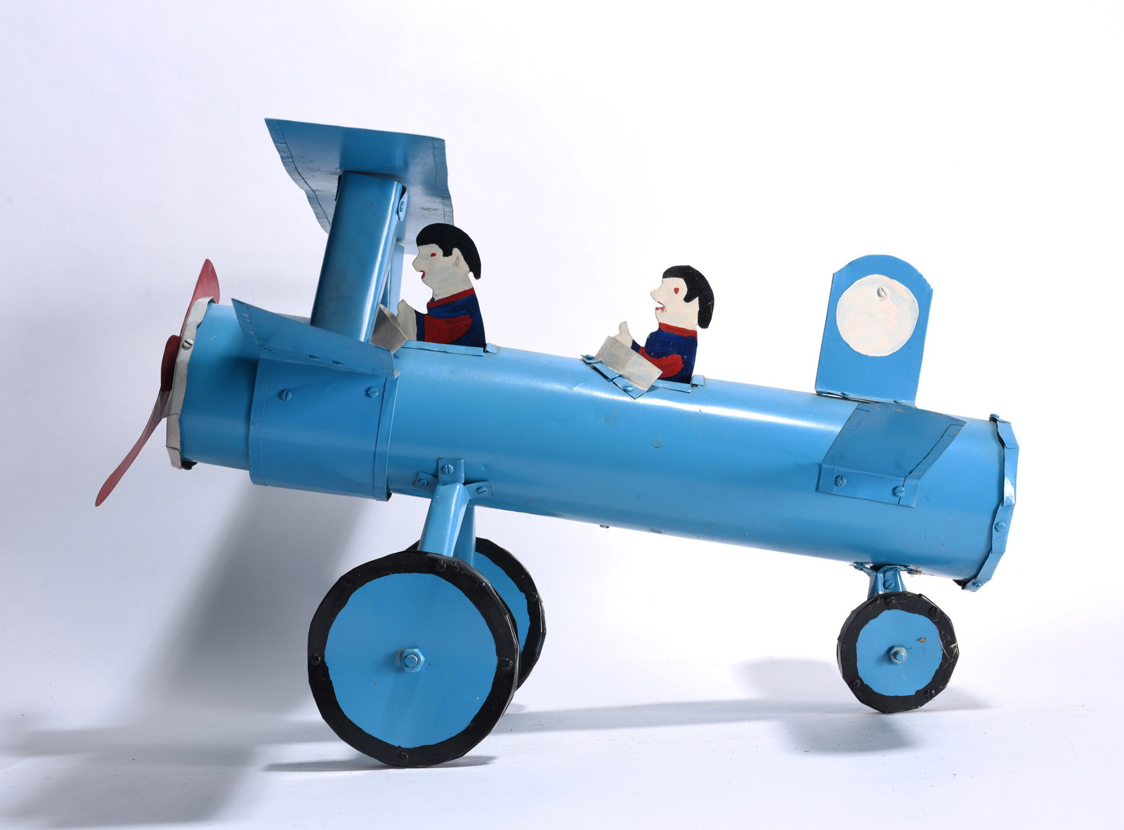 Tom Baldwin Metal Plane Sculpture: shaped and formed metal into a plane, paint, signed on bottom dated 1996