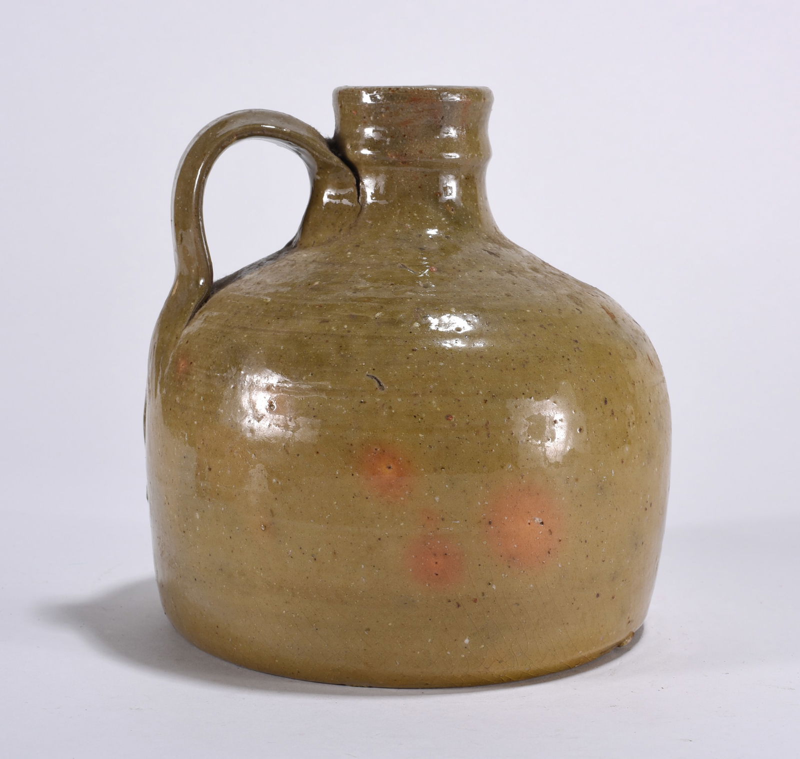 Aumen Pottery Jug: Pottery jug. Mustard color.