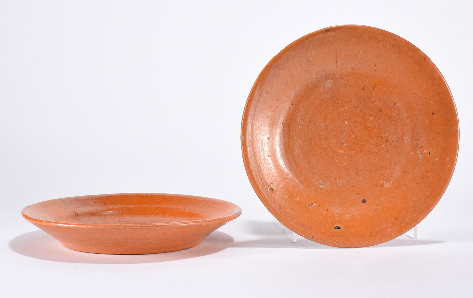 Jugtown Pottery Dirt Dish: Pottery dirt dish. Orange. Stamped on bottom.