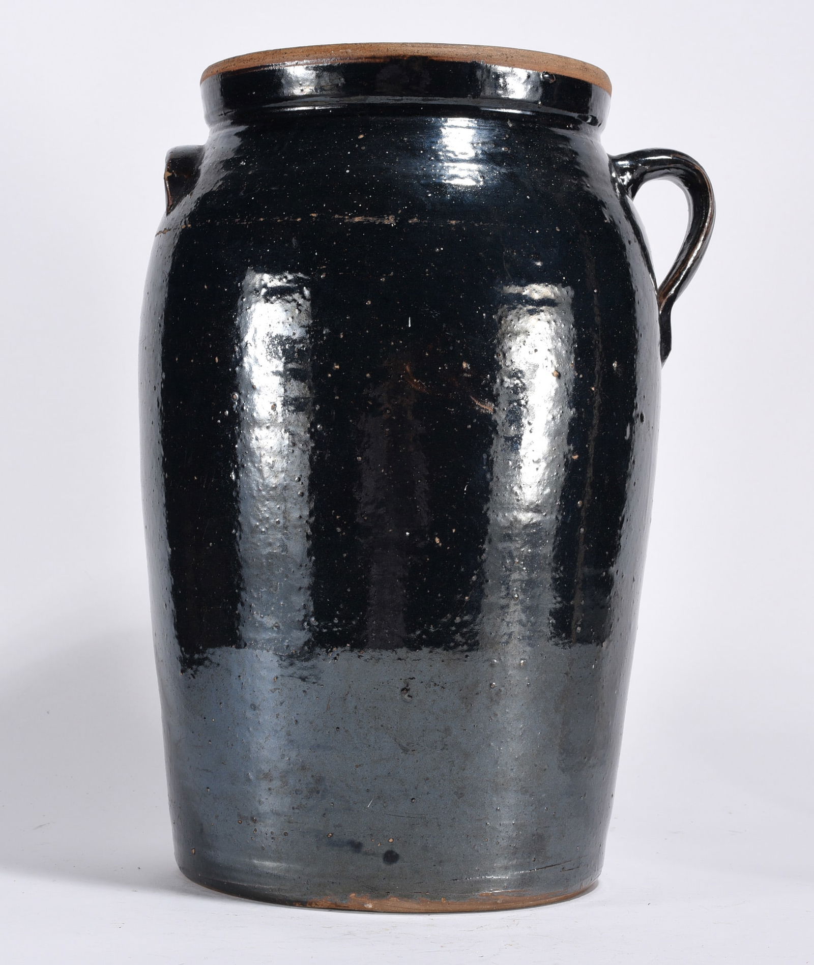 Pottery Storage Jar: Pottery storage jar. Black.