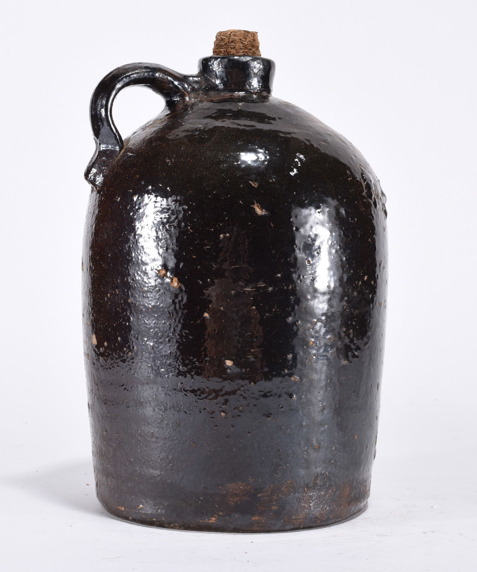 Pottery Jug: Pottery jug. Brown.