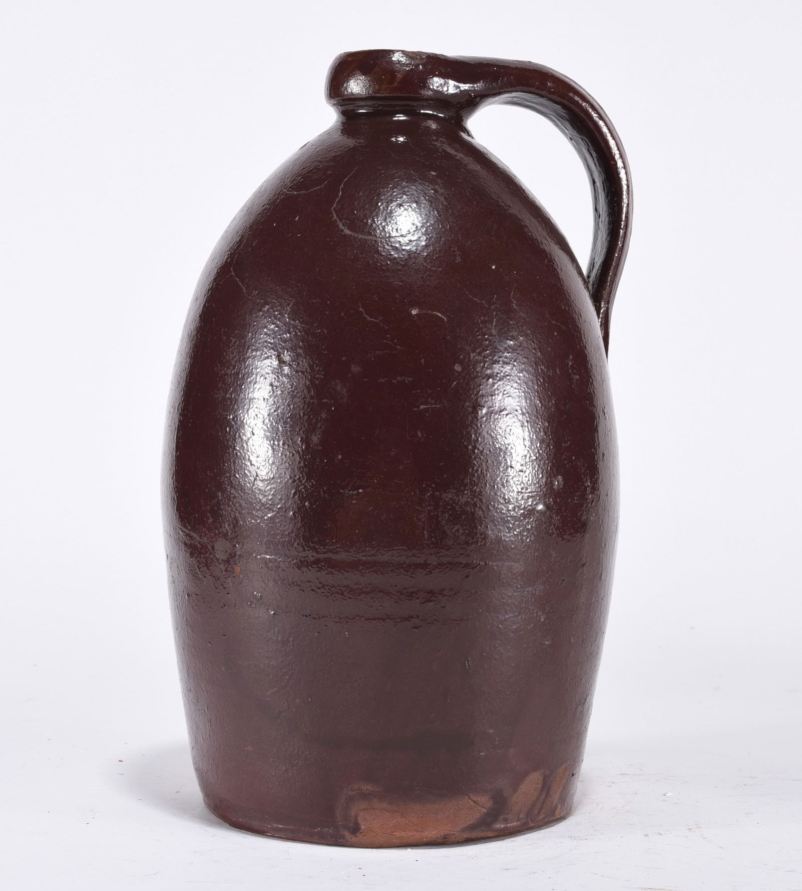 Pottery Jug: Pottery jug. Red.