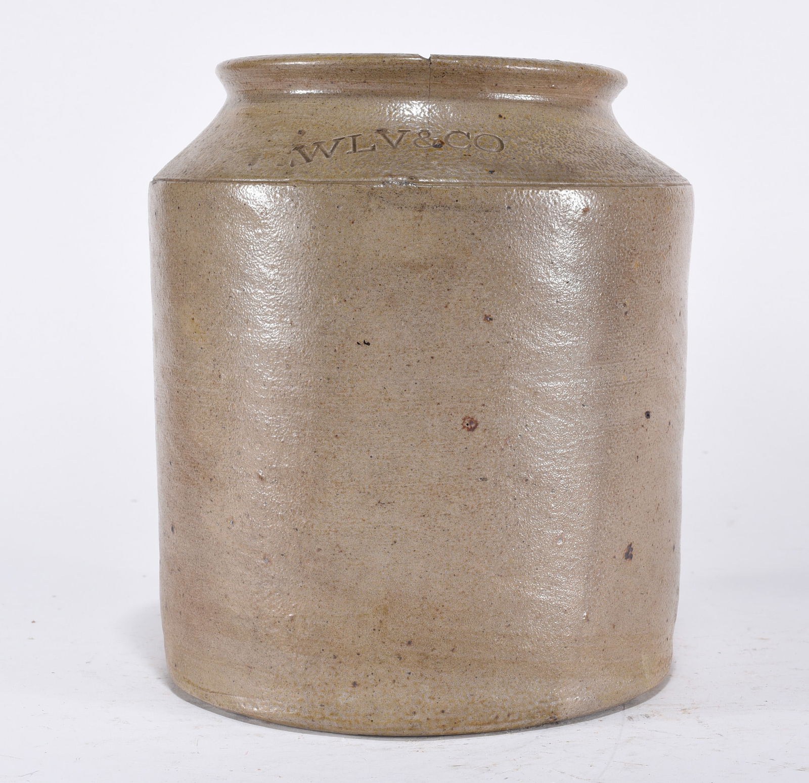 WLV & Co. Stoneware Jar: Pottery storage jar. Stamped "WLV & CO."