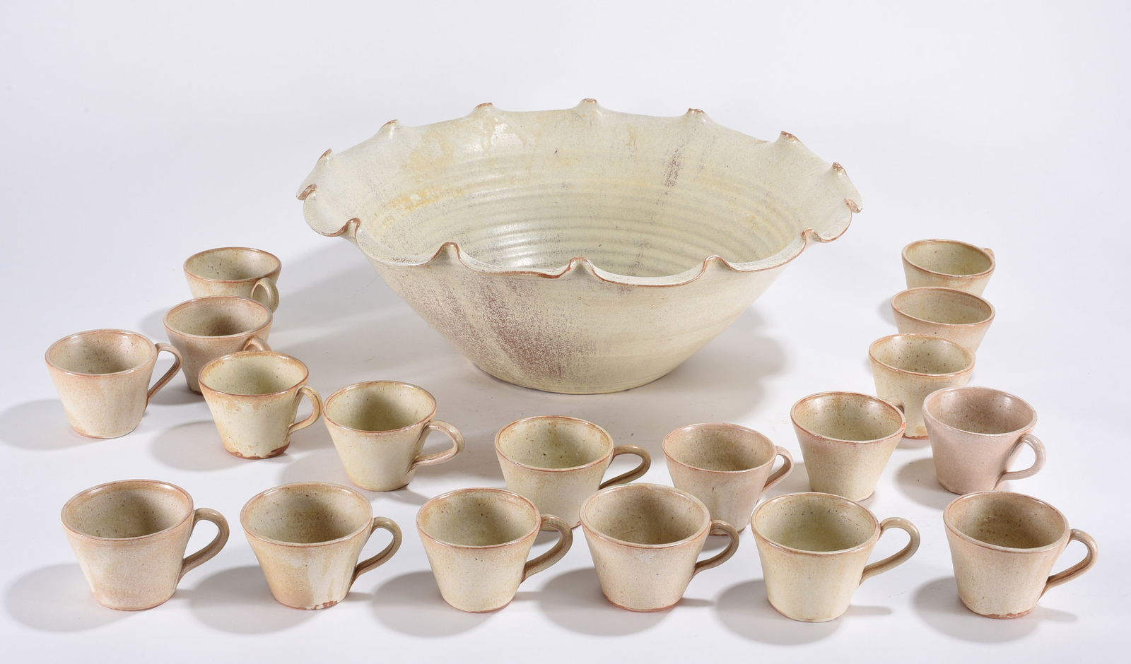 North Carolina Pottery Punch Bowl Set: Set of 18 cups and serving bowl.