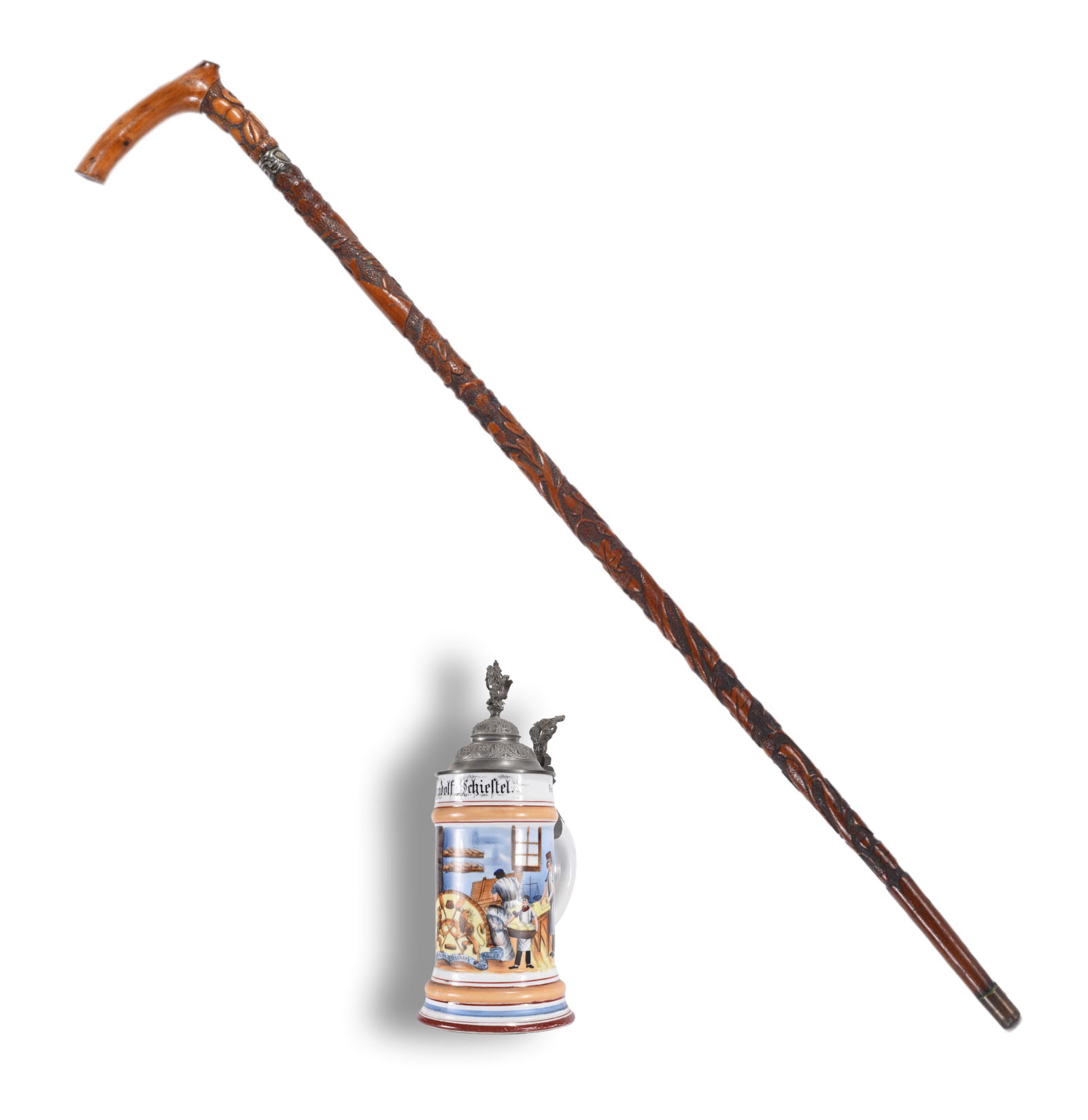 ca. 1890 Folk Art Bakers Cane with Stein: cane is 35" and stein is 12" folk art cane made for a baker. Pretzels, nuts and flowers. Ca. 1890. also with this lot is a beer stein with the bakers name on it.