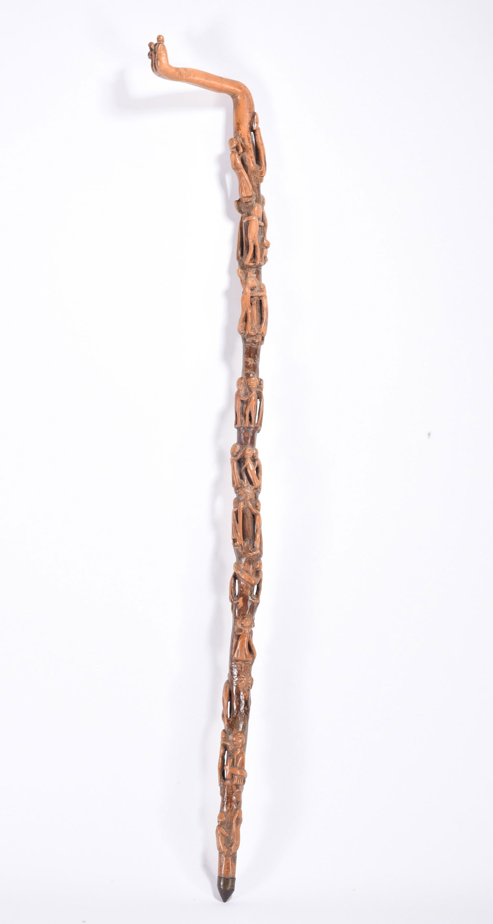 Outstanding Folk Art Carved Cane ca. 1890: ca. 1890 carved walking stick with relegiouse symbols of carrying a cross in different areas of the cane. Carved tip to top with people. Very minor losses in one spot.