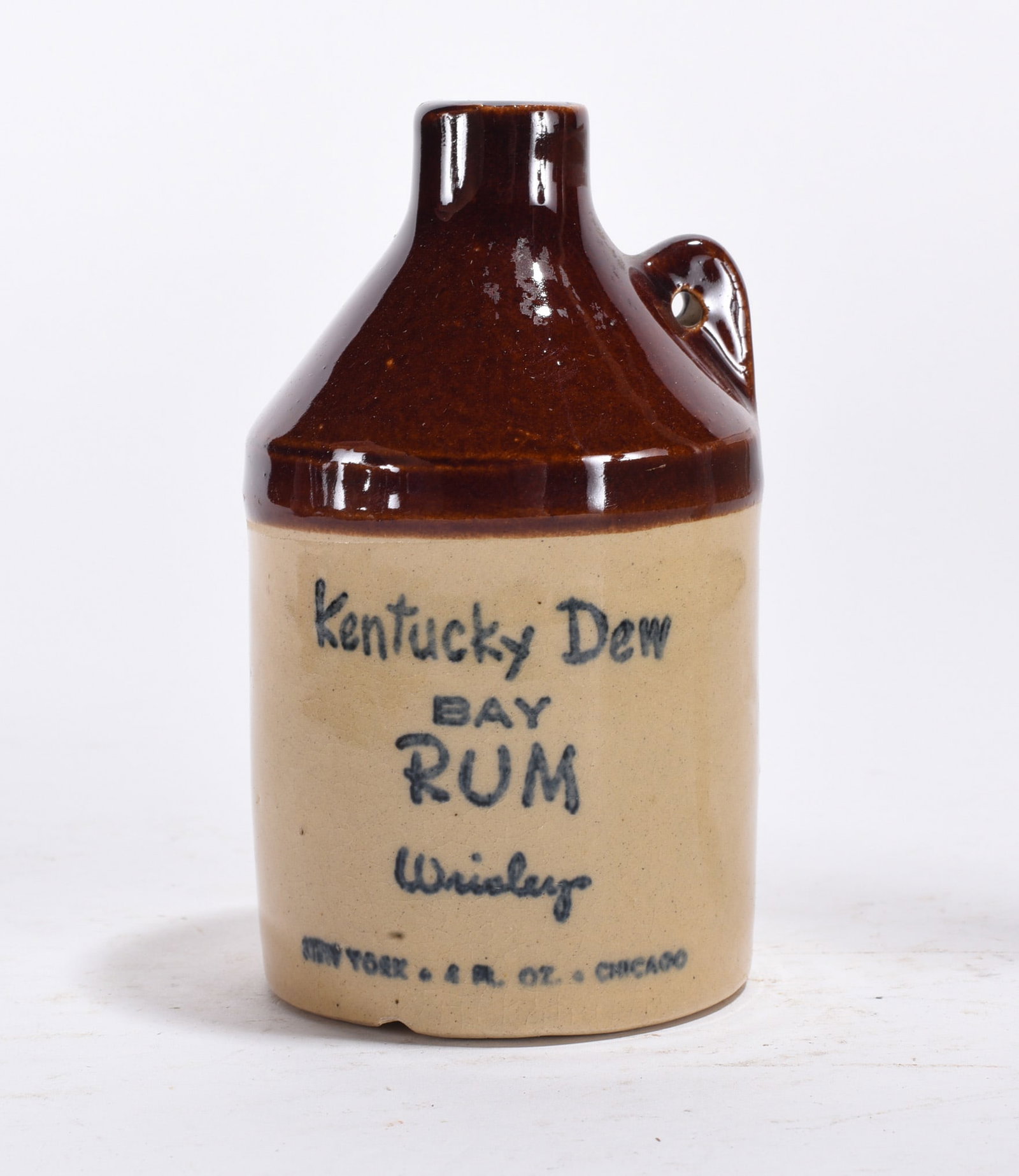 Kenucky Dew Miniature Pottery Jug (1 of 3)
