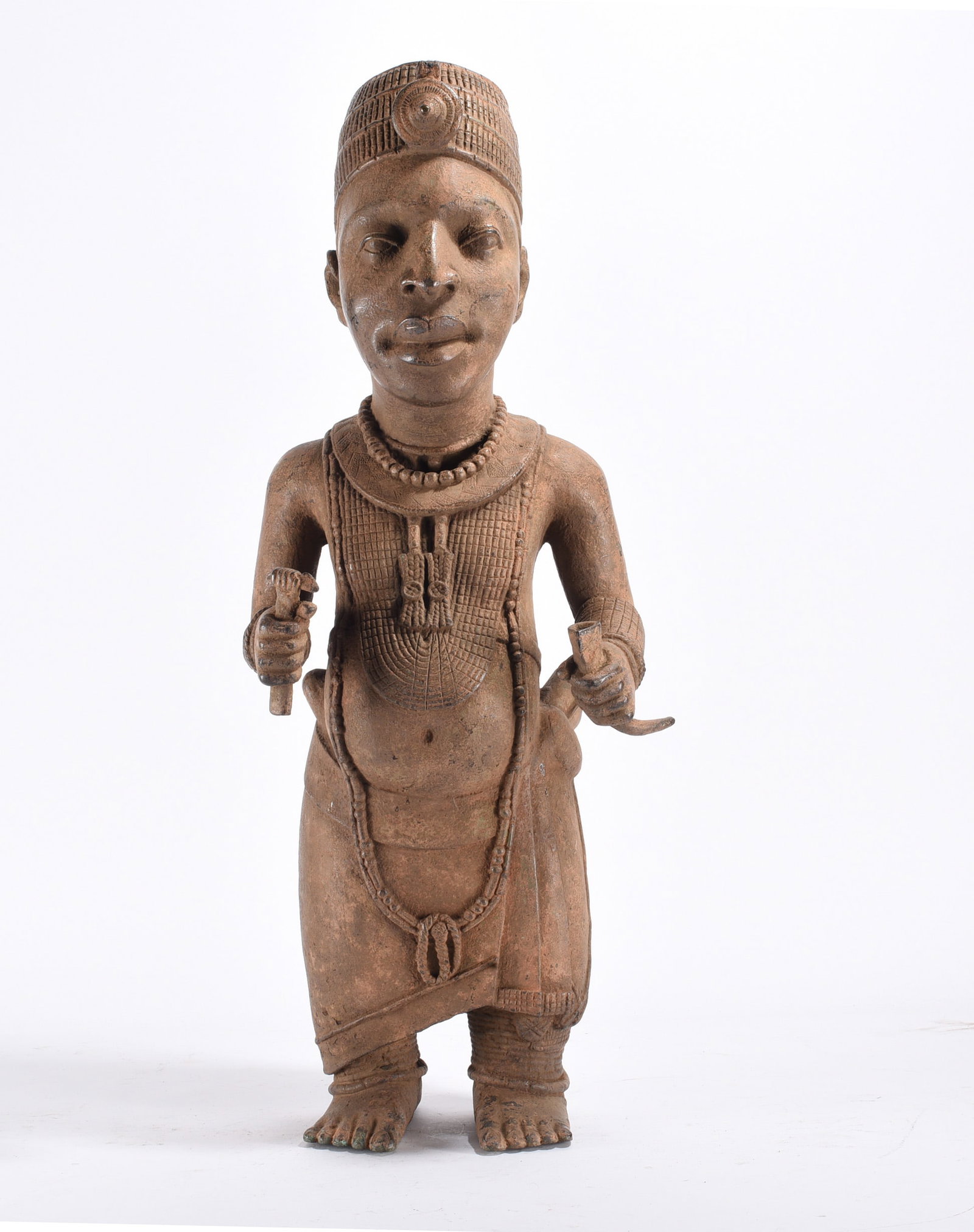 18th Century Bronze Figure of Ooni (King) of Life: this bronze could be older dating back to the 11th or 12th century. Depicts a sacred king adonred with heavliy beaded costume, jewelry, and a crown. Holding a scepter in the right hand and an antelope