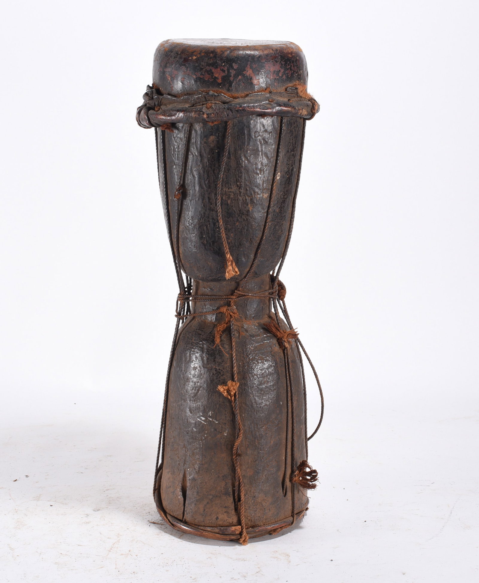 Antique Kundu Drum Papua New Guinea: Kundu drum, a type of hourglass-shaped musical instrument traditional to Papua New Guinea, Ancient African Art Wood Carving 19"