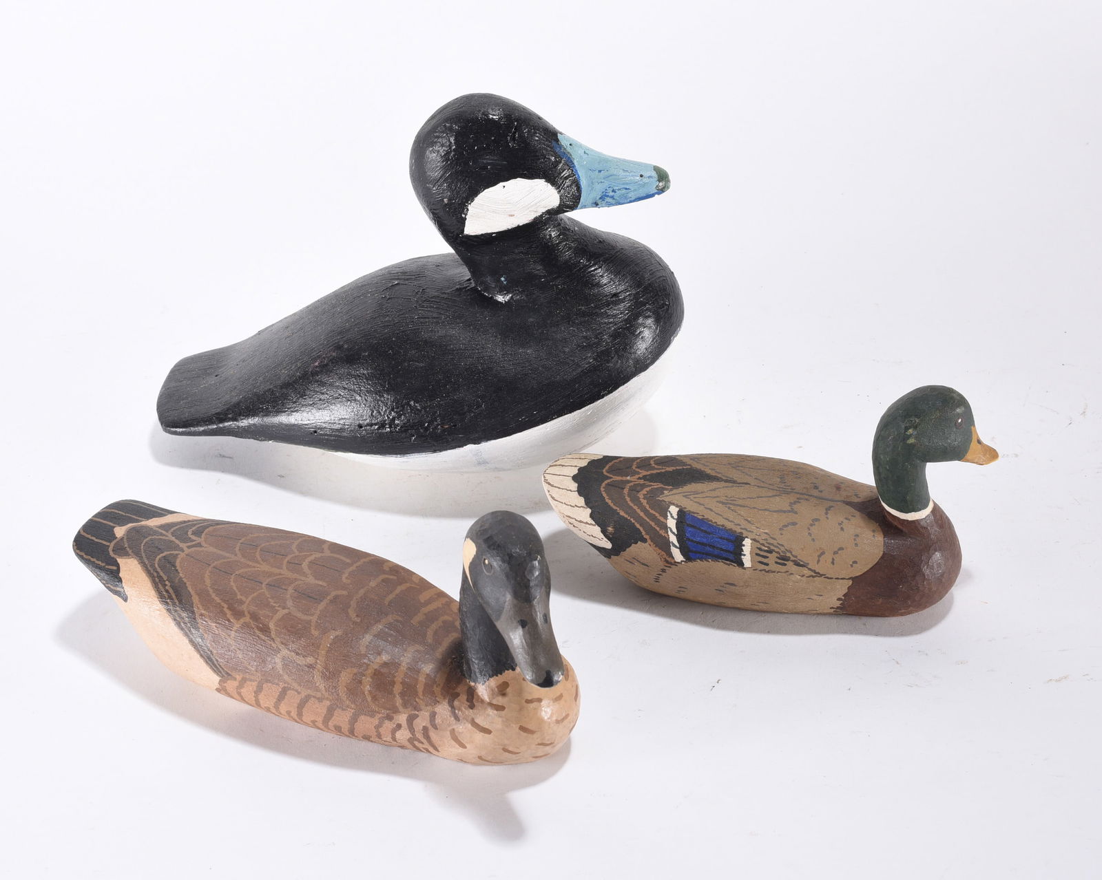 Ronald Holmes Group of Painted Decoys: avg. size 9"Ronald Holmes Group of Painted Decoys