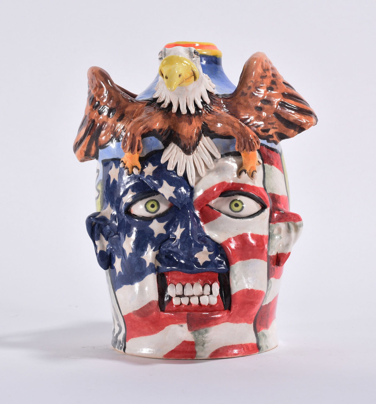Stacy Lambert America Face Jug: Stacy Lambert America Face Jug Stacy Lambert (American, North Carolina, contemporary) is a folk potter known for face jugs and sculptural stoneware rooted in the Seagrove tradition.