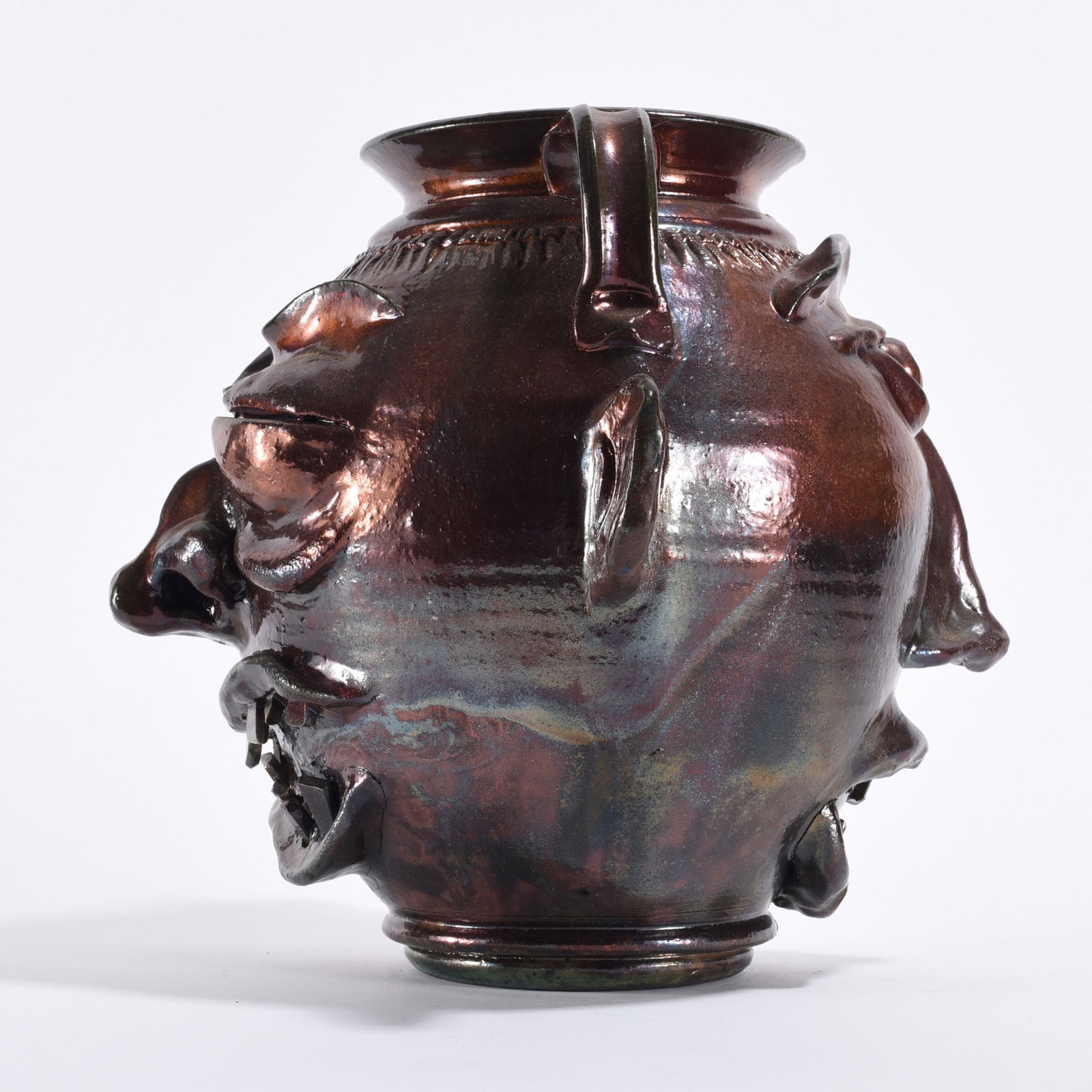 John Sanders Double Face Jug: John Sanders Double Face Jug John Sanders (American, contemporary) is a Southern folk potter known for face jugs and sculptural stoneware forms.