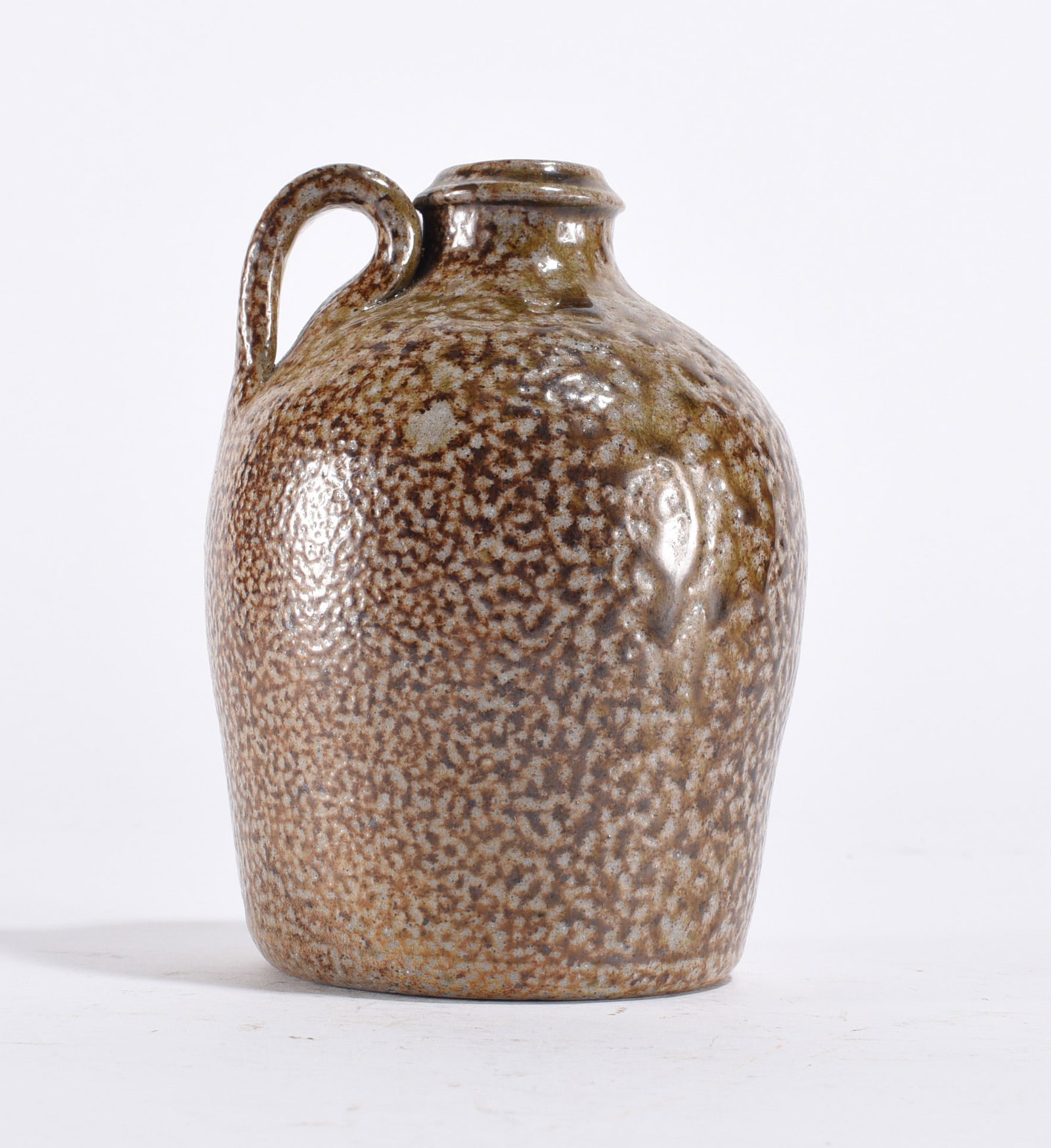 Small Covered Stoneware Vessel: Small covered stoneware vessel with speckled glaze, possibly regional studio pottery.