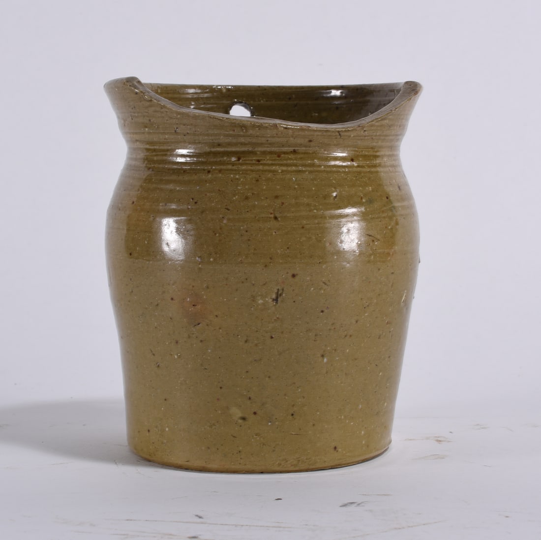 Small North Carolina Pottery Cup by Auman ca. 1930: Small North Carolina Pottery Cup by Auman ca. 1930 We do offer in house shipping for items under 36" - boxes 10"x10"x10" we can ship for around $21 or less. - boxes 18x18x18 we can ship for around $56