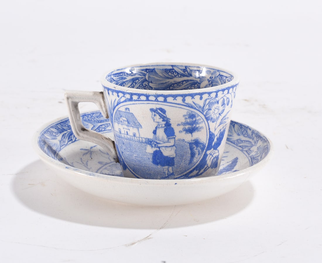 White Ironstone Mug: Plain white ironstone mug with simple handle.