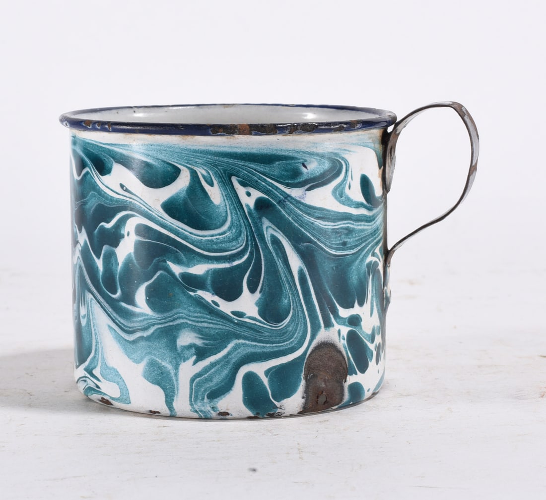 Blue & White Enamel Mug: Enamel basin with teal and white swirl pattern, wear to rim