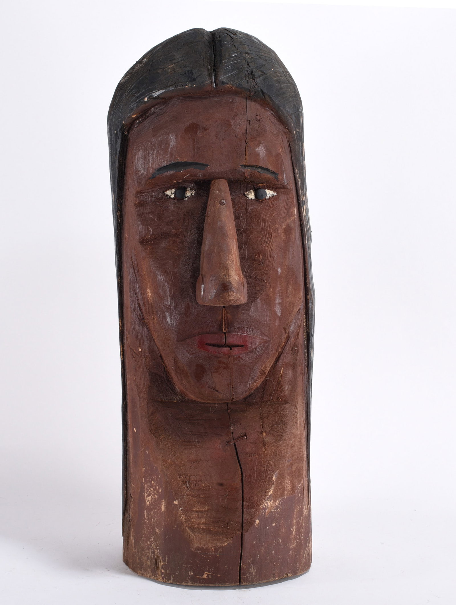 Ernie Richardson Carved Indian Head: 26" - carved wood and paint by Virginia artist Ernie Richardson. Ernie carved hundreds of totems and carvings. He was represented mostly by Bill Jones back in the 90s and 2000s. please see photos