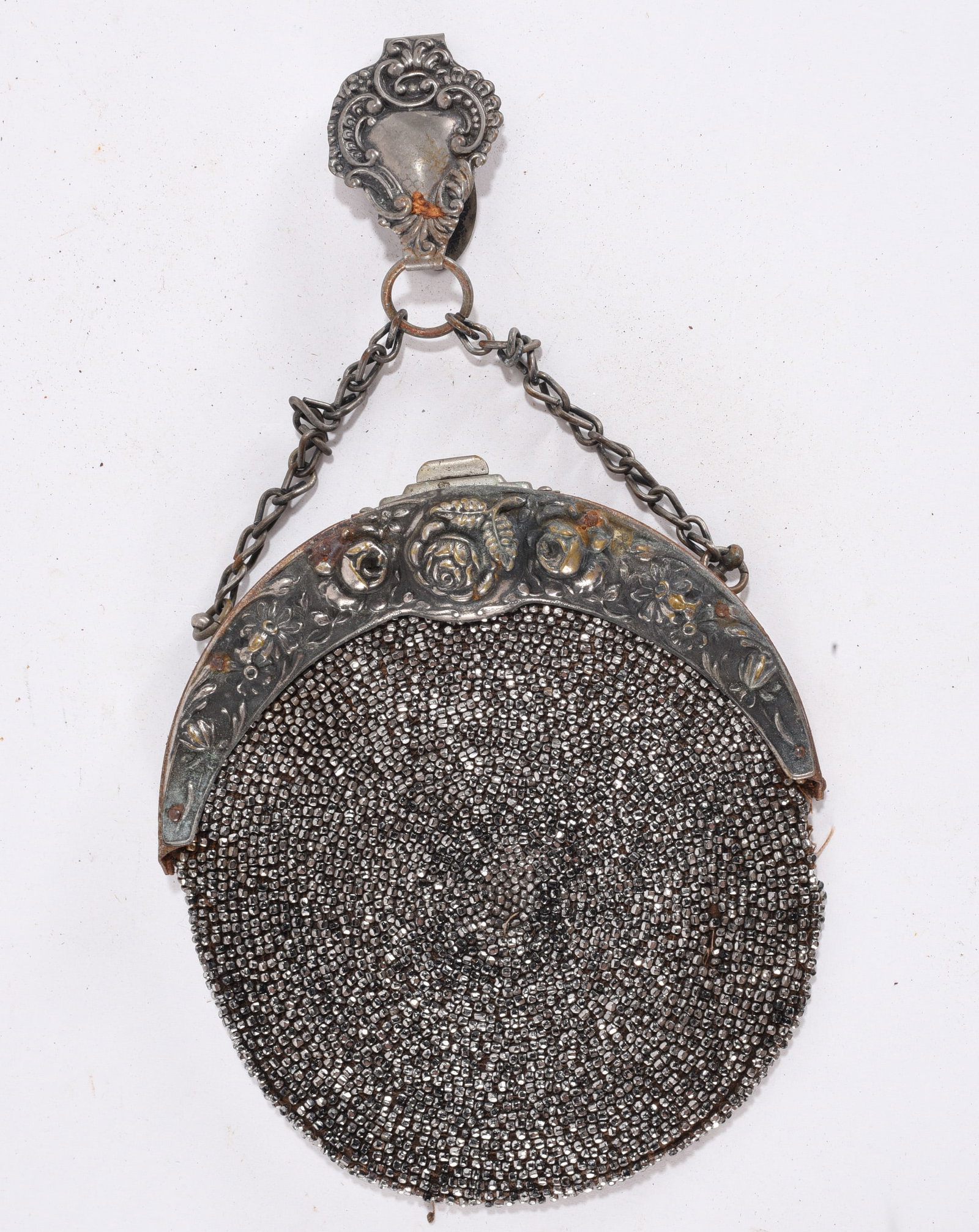 Vintage Round Cut Steel Beaded Purse with Ornate Frame: 5"x6"--Round vintage purse with densely set cut steel beads and ornate metal frame with chain handle;intricate early 20th century design
