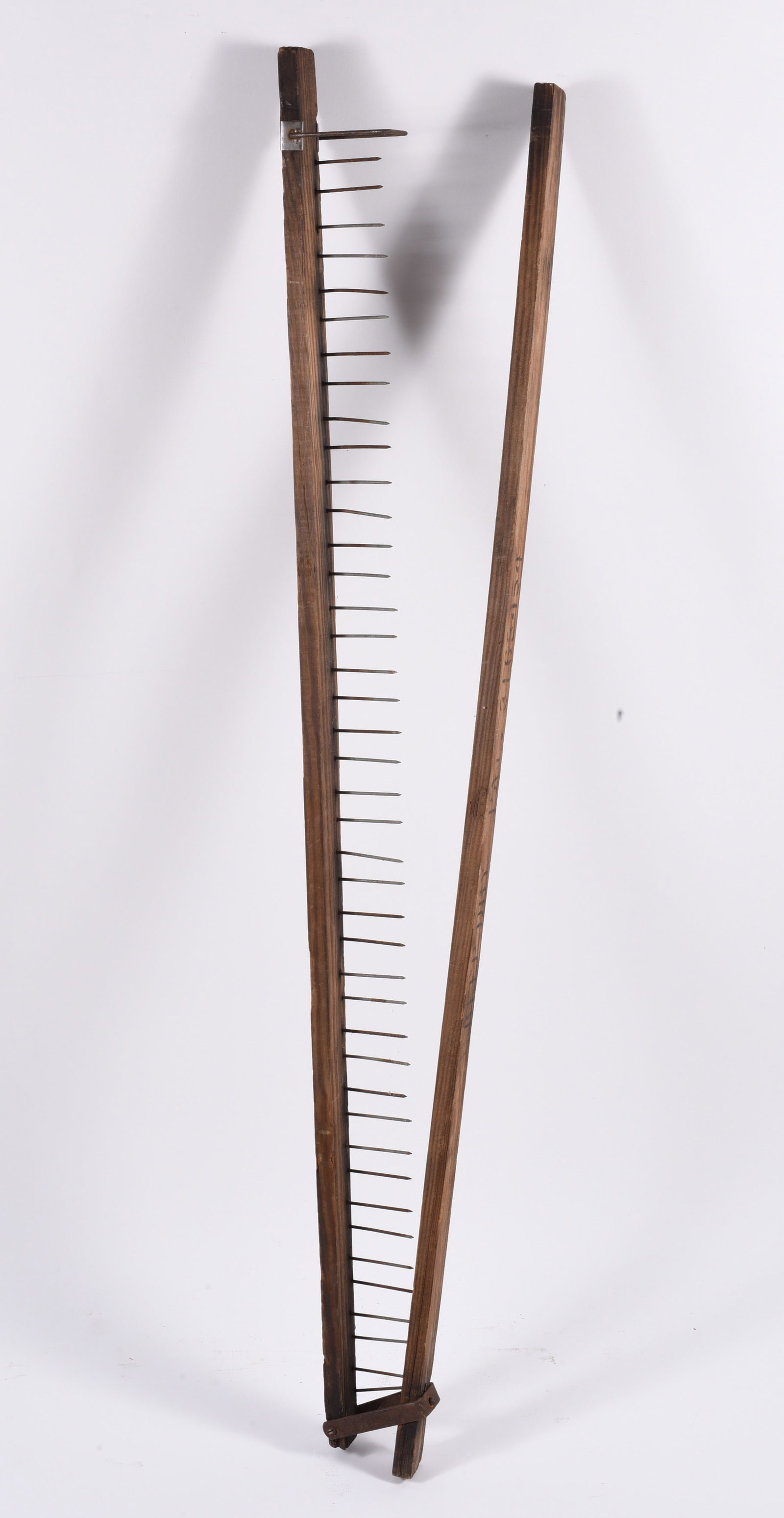 Primitive Wooden Flax Hackle Tool with Iron Spikes: 53" -- Primitive wooden flax hackle tool with iron spikes used for processing fibers;authentic antique farm tool