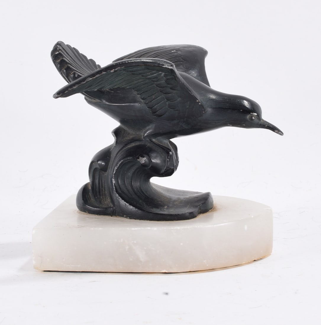 Metal Seagull on Stone Bookend: 5"x5" -- Metal sculpture on stone. please see photos for condition. All items are in estate condition We do offer in house shipping for items under 36" boxes 10"x10"x10" we can ship for around $21. bo