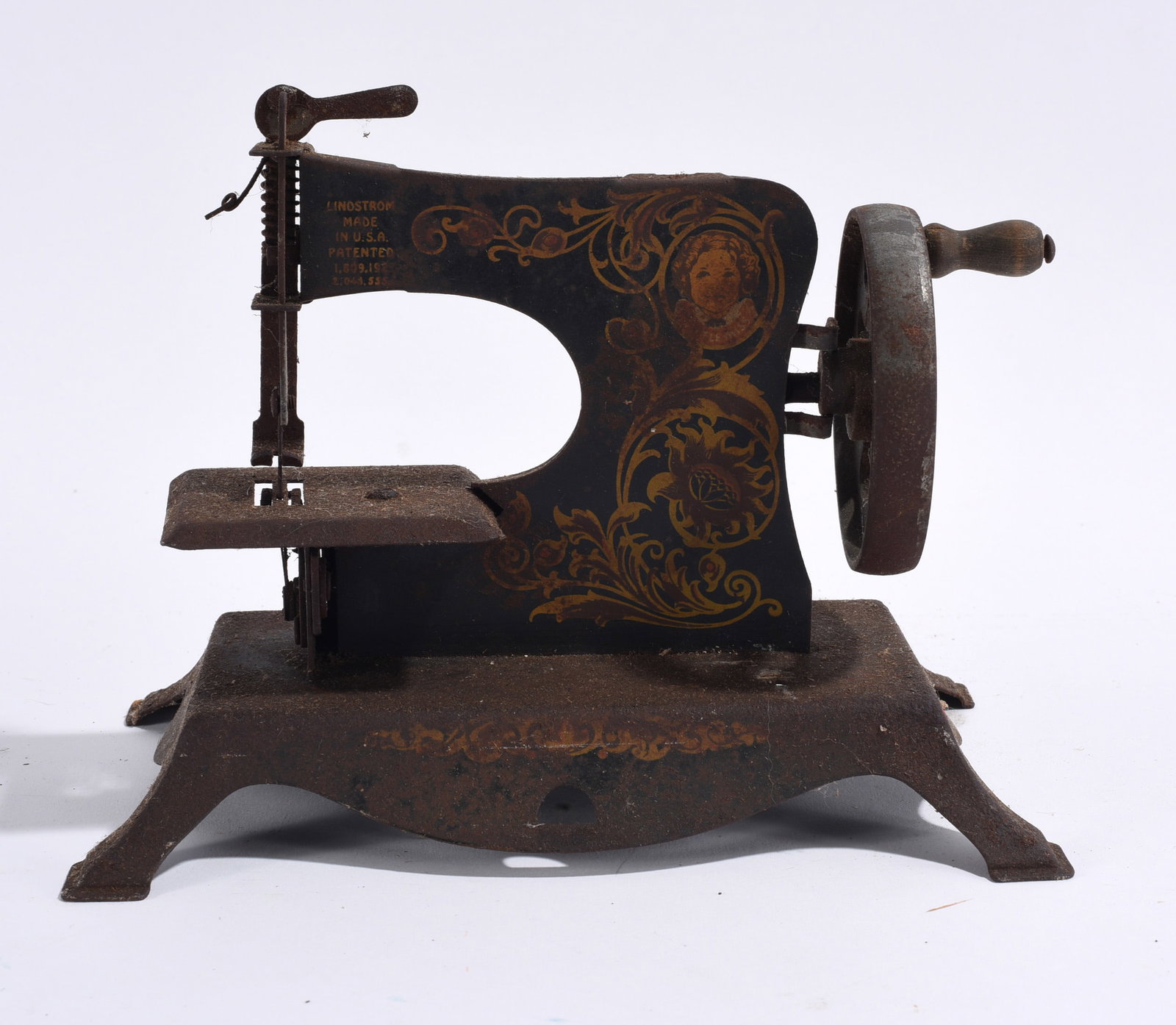 Antique Miniature Sewing Machine (1 of 2)