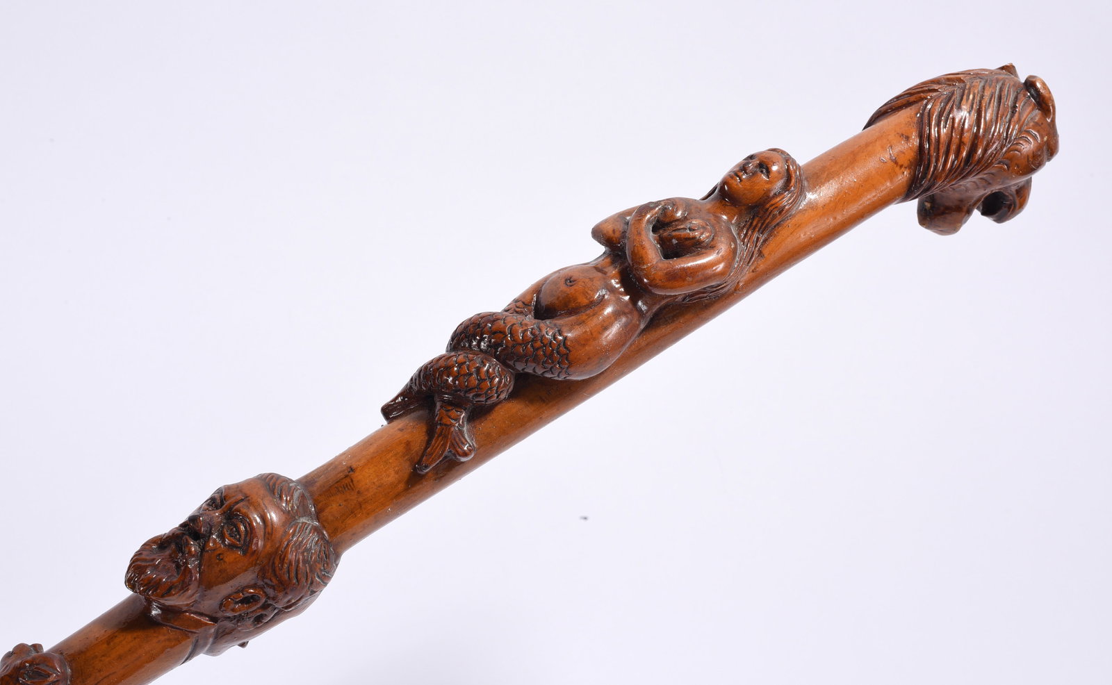 Oustanding Folk Art Carved Cane ca. 1890: 36" nude mermaide folk art cane ca. 1890 carved in high relief. please see photos for condition. All items are in estate condition We do offer in house shipping for items under 36" boxes 10"x10"x10" w