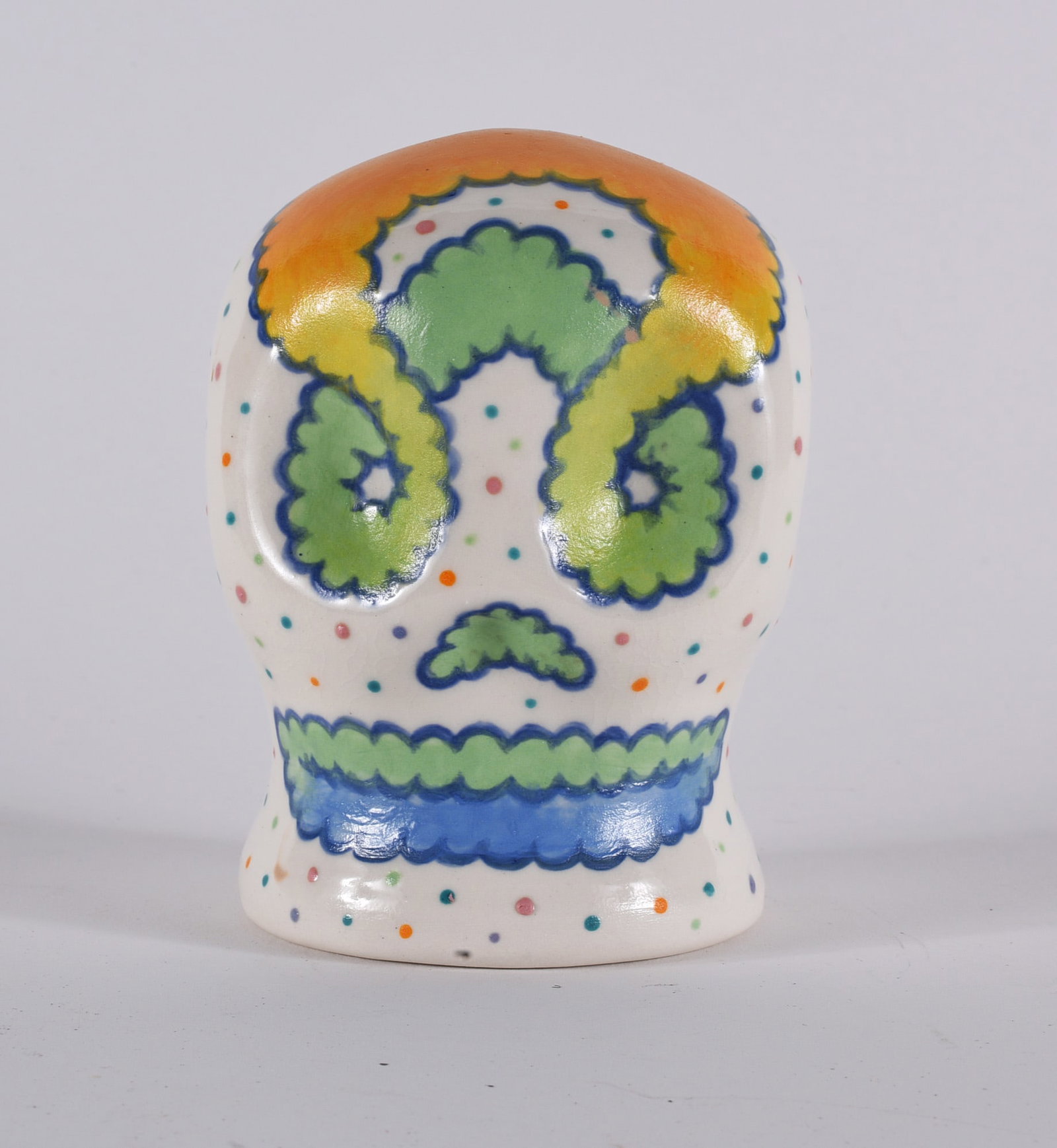 Michael Gates Folk Pottery Skeleton Head: 5" folk pottery skeleton head. Signed on bottom.Michaael Gates is a descendent of the Reinhardt family of potters in North Carolina. please see photos for condition. All items are in estate condition 