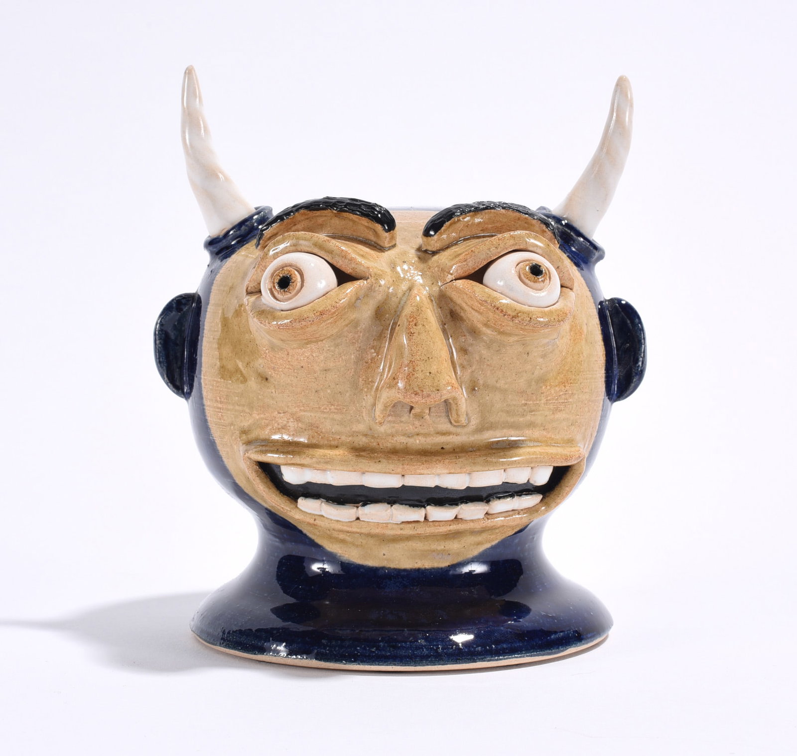 Pottery Devil Head Signed Bean: 5" pottery devil head signed BEAN. We do offer in house shipping for items under 36" boxes 10"x10"x10" we can ship for around $21. boxes 18x18x18 we can ship for around $56 - $65. to get in house ship