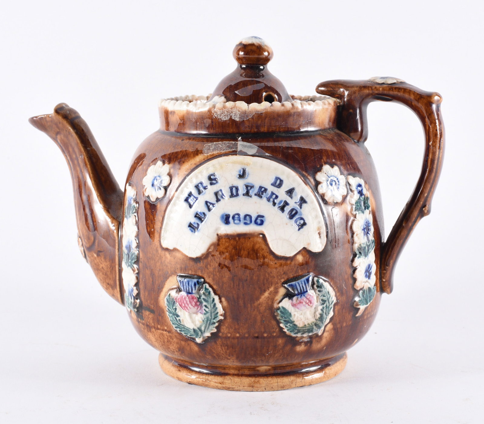 English Brown Glazed Relief Decorated Teapot Dated 1896 (1 of 3)