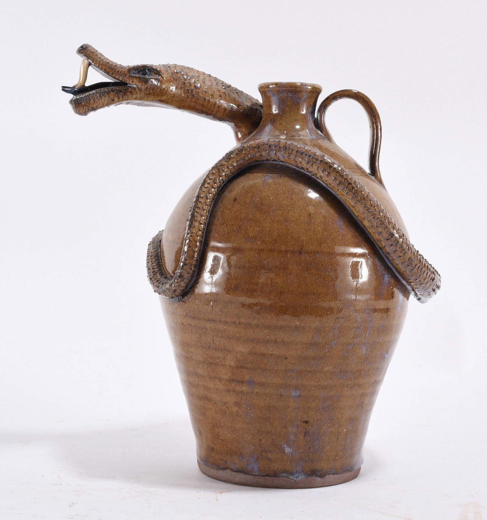 Don Craig Snake Jug: 12" -- outstanding snake jug by Don Craig, signed on the shoulder. please see photos for condition. All items are in estate condition We do offer in house shipping for items under 36" boxes 10"x10"x10
