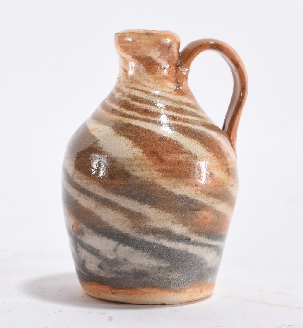 Burlon Craig Miniature Jug: 4" --miniature pottery jug by Burlon Craig, signed on bottom. Condition is excellent. please see photos for condition. All items are in estate condition We do offer in house shipping for items under 3