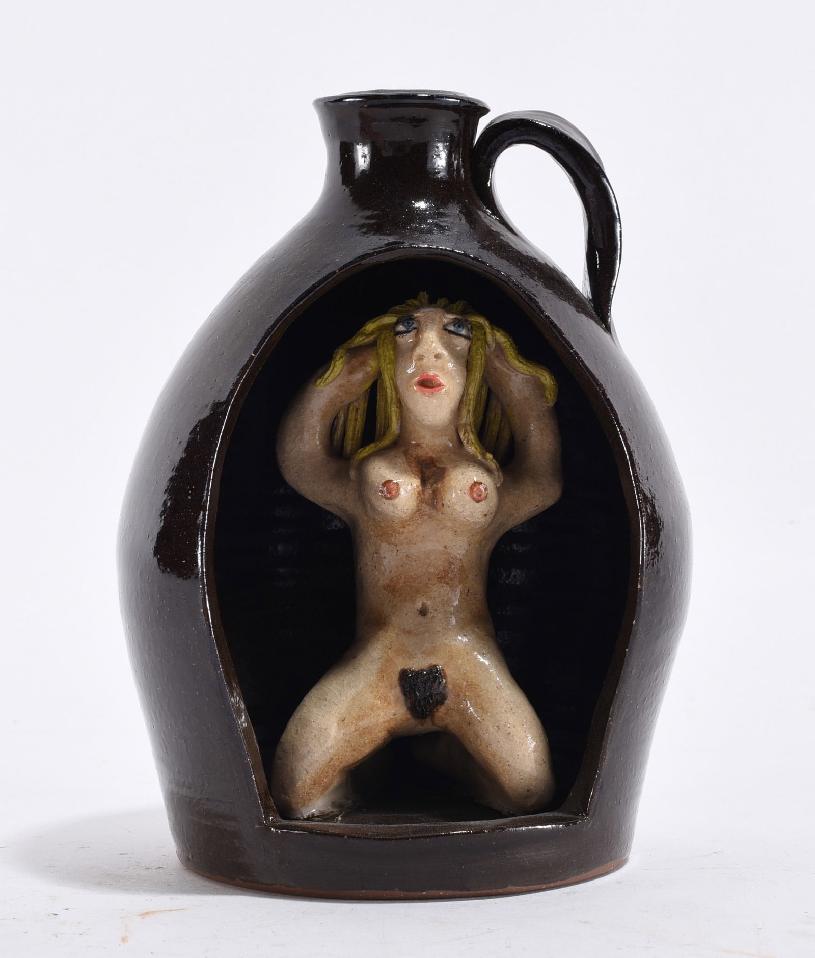Stacy Lambert Nude Folk Pottery Jug: 6" --pottery jug with an opening and a nude figure kneeling. Signed on bottom dated 2001. Condition is excellent. please see photos for condition. All items are in estate condition We do offer in hous