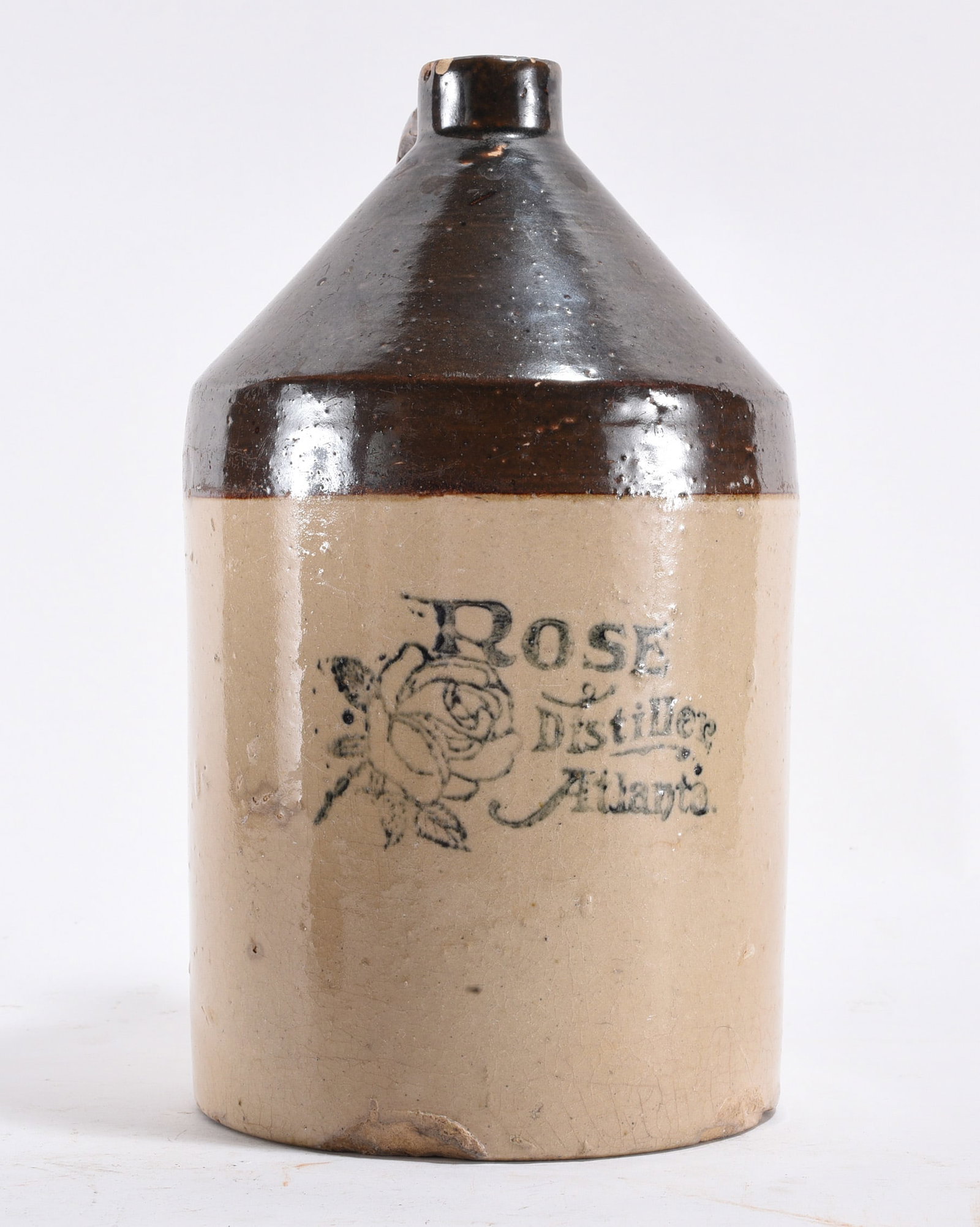 Atlanta Georgia Advertising Stoneware Jug: 12" --Rose Distiller advertising stoneware jug Atlanta GA.. Condition is excellent. please see photos for condition. All items are in estate condition We do offer in house shipping for items under 36"