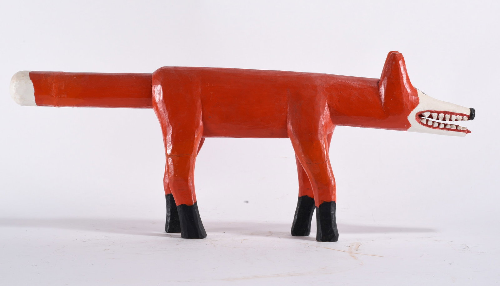 Garland and Miniie Adkins Carved Fox: 12" --carved and painted wood. Great condition. Signed on bottom foot. please see photos for condition. All items are in estate condition We do offer in house shipping for items under 36" boxes 10"x10