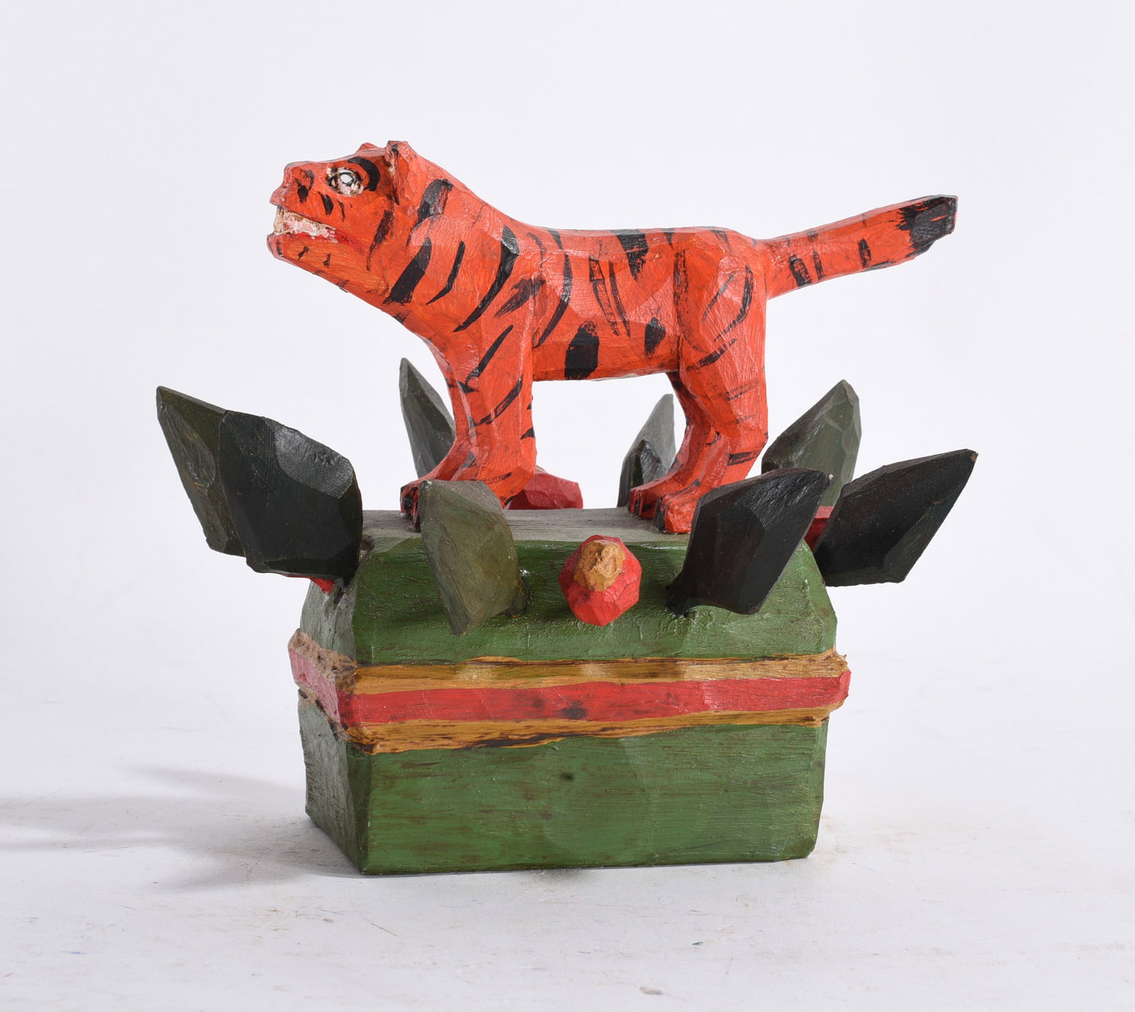 Daniel Strawser Carved Lion: 5"x5" --carved wood and paint, signed on bottom. please see photos for condition. All items are in estate condition We do offer in house shipping for items under 36" boxes 10"x10"x10" we can ship for 