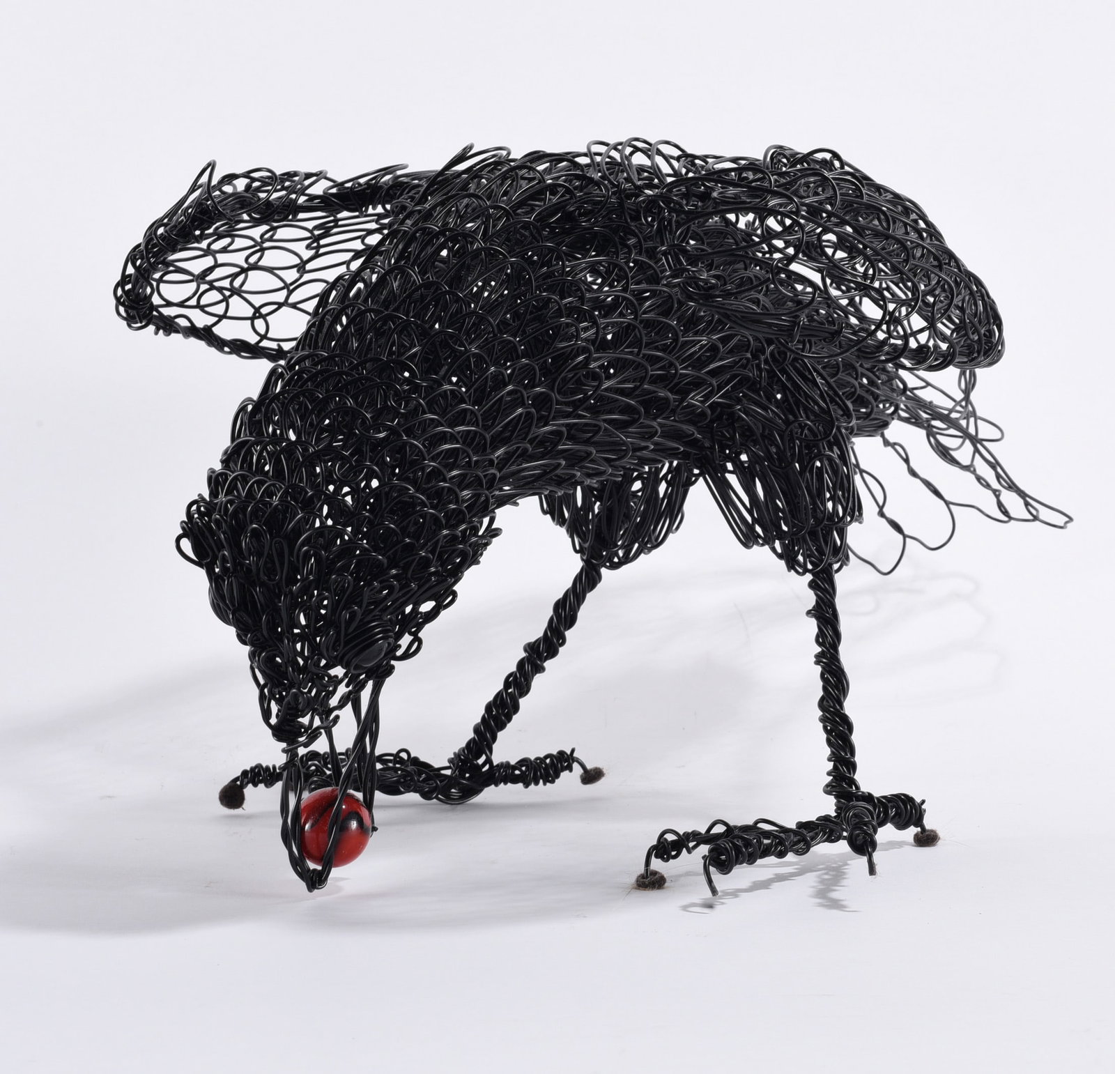 Josh Cote Folk Art Crow: 10"x15" -- wire material crow by Josh Cote. please see photos for condition. All items are in estate condition We do offer in house shipping for items under 36" boxes 10"x10"x10" we can ship for aroun