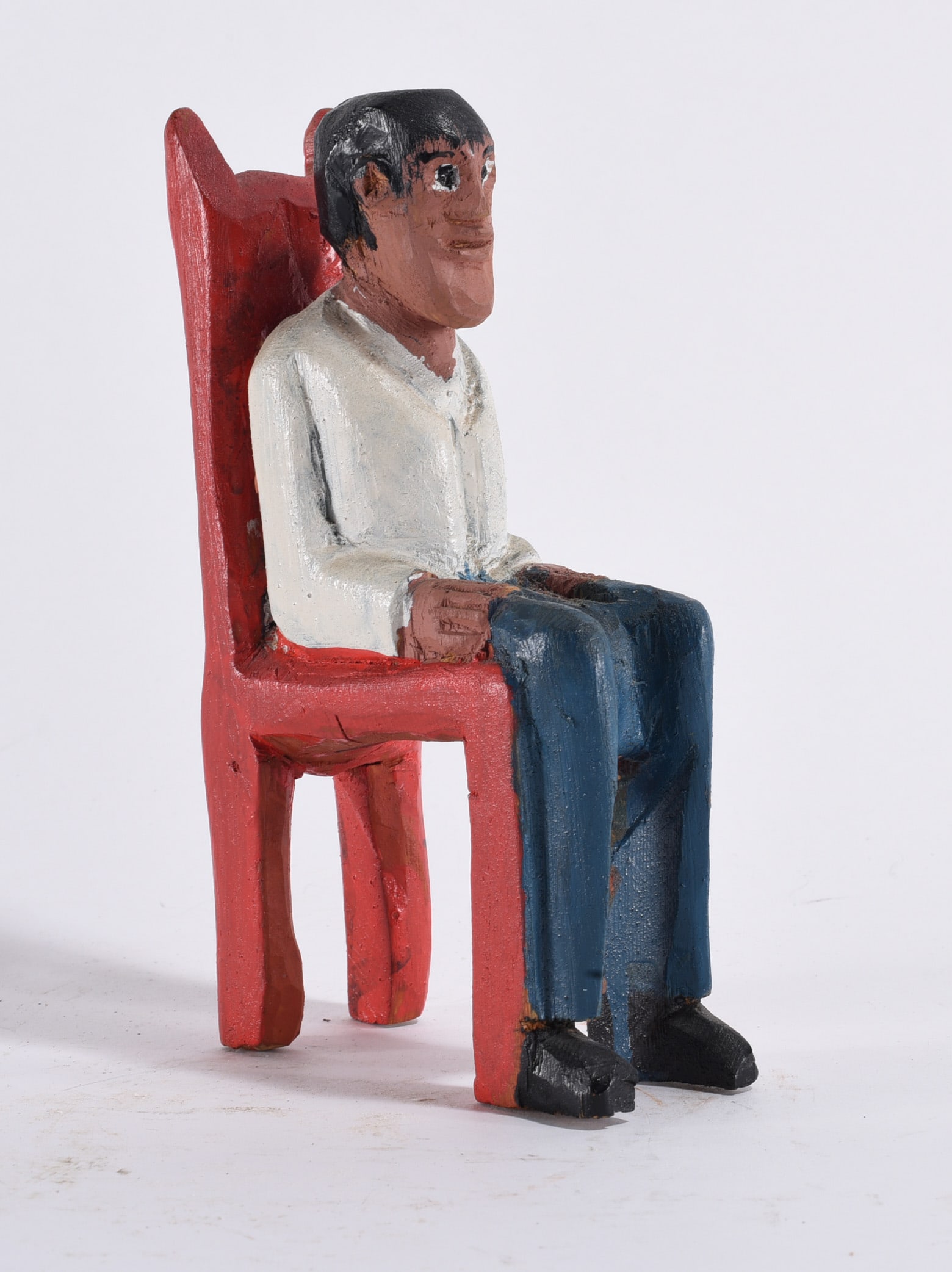 Carved Wooden Figure in Chair Signed EP: 7" -- signed on bottom EP. Carved wood and paint. please see photos for condition. All items are in estate condition We do offer in house shipping for items under 36" boxes 10"x10"x10" we can ship for
