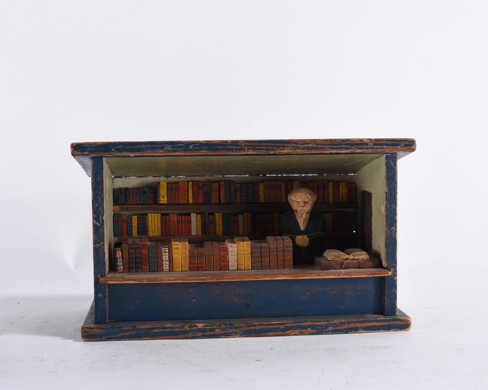 Carved Wooden Librarian: 5"x9" -- carved wood and paint. please see photos for condition. All items are in estate condition We do offer in house shipping for items under 36" boxes 10"x10"x10" we can ship for around $21. boxes