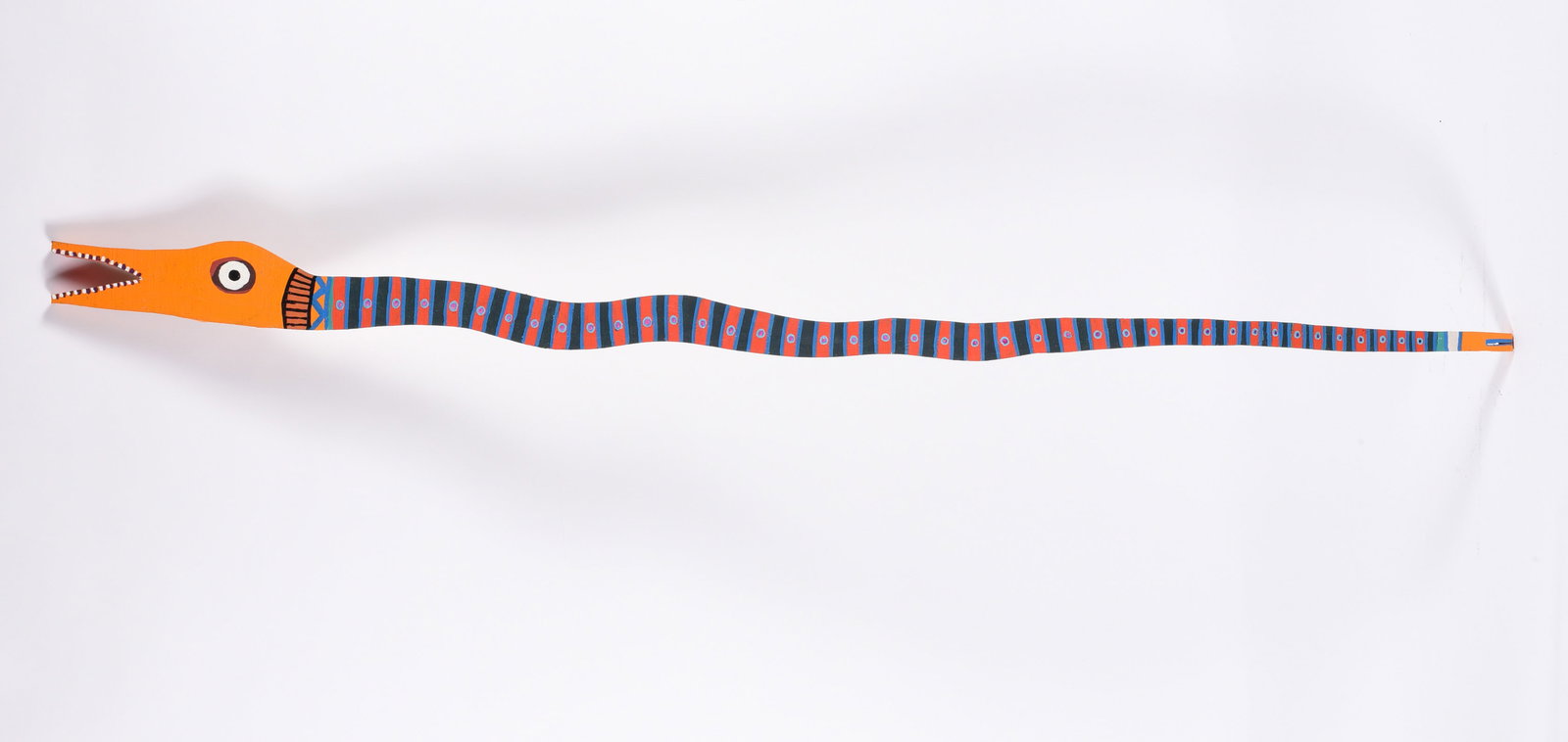 Clark C. Wooden Painted Snake: 76" -- painted snake, large. Signed on back. please see photos for condition. All items are in estate condition We do offer in house shipping for items under 36" boxes 10"x10"x10" we can ship for arou