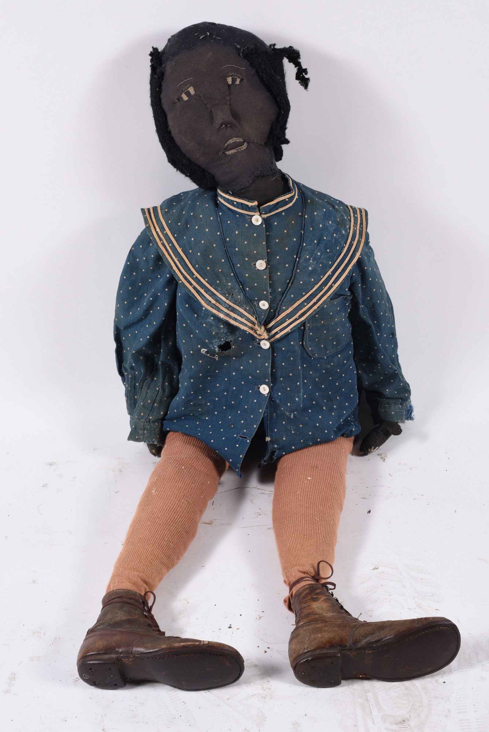 Antique Black Doll: 42"-- black doll with original clothes ca. 1910. please see photos for condition. All items are in estate condition We do offer in house shipping for items under 36" boxes 10"x10"x10" we can ship for 