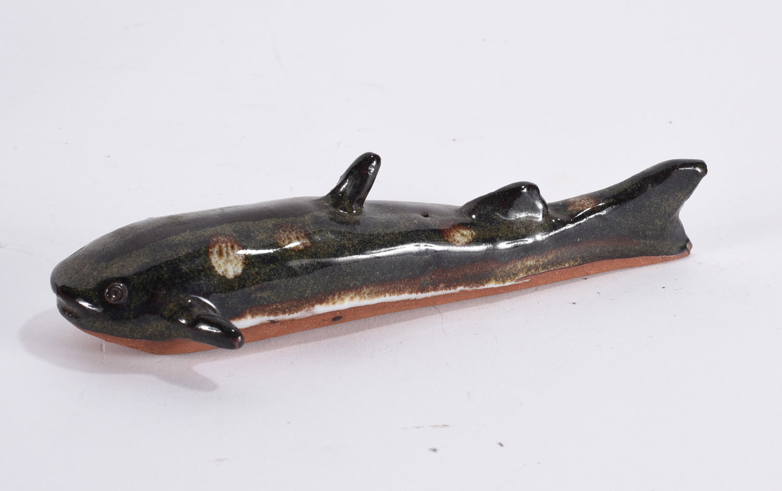 Charles Moore Catfish: Charles Moore Catfish 6" Semi rare slip decorated catfish signed on bottom with Jugtown stamp. Dated 2003. all pottery in this auction is mint as fired condition with no repairs or cracks in the body.