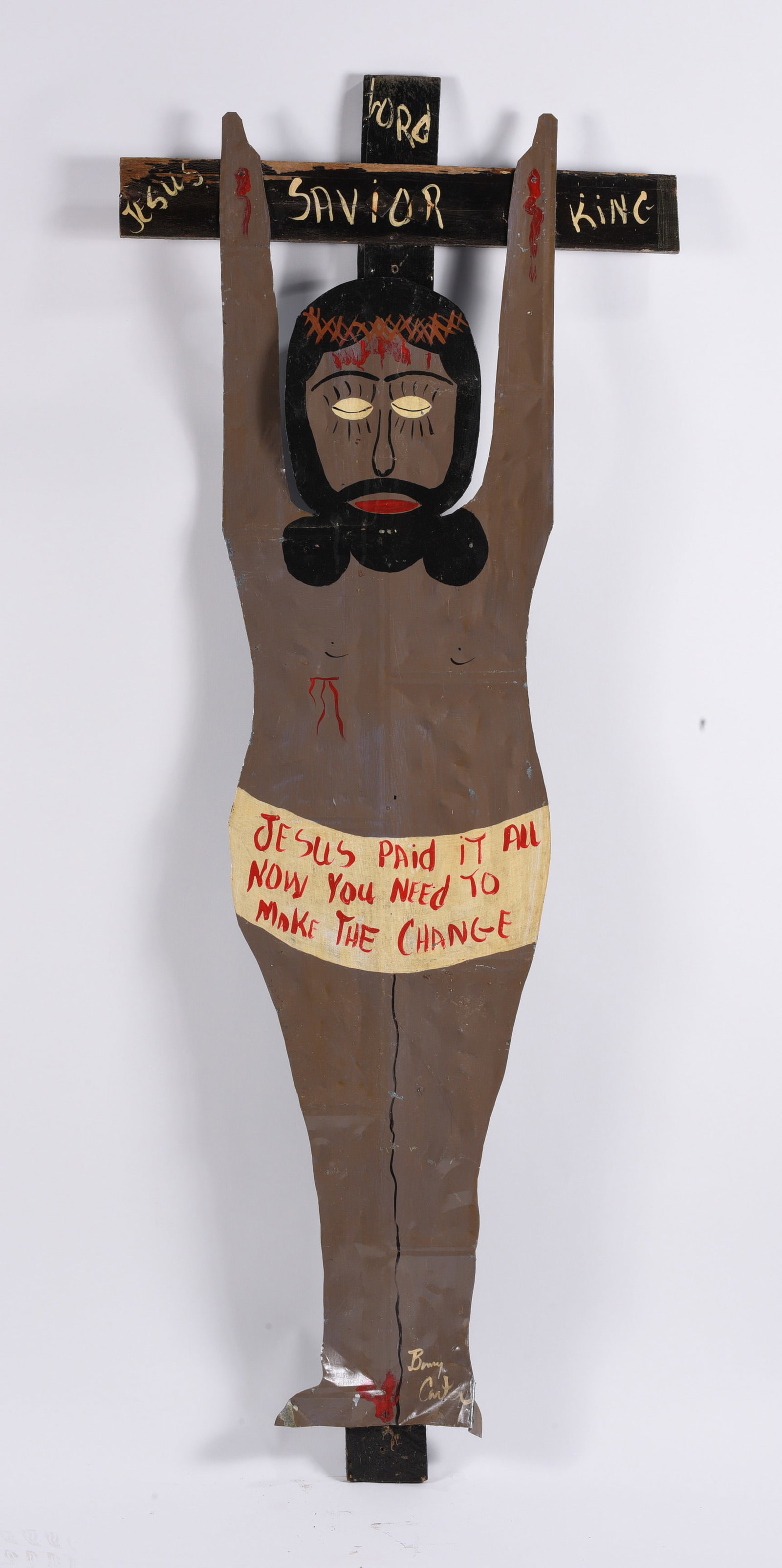Benny Carter Tin Jesus on Cross: Benny Carter Tin Jesus on Cross 24"x60" This is a very rare tin cutout with paint applied to a wooden cross. Built and painted by Benny Carter. This is from a series of 10 that are known of all sizes.