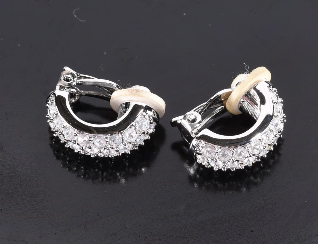 Swarovski pure crystal huggies marked w/ Swan. (1 of 2)