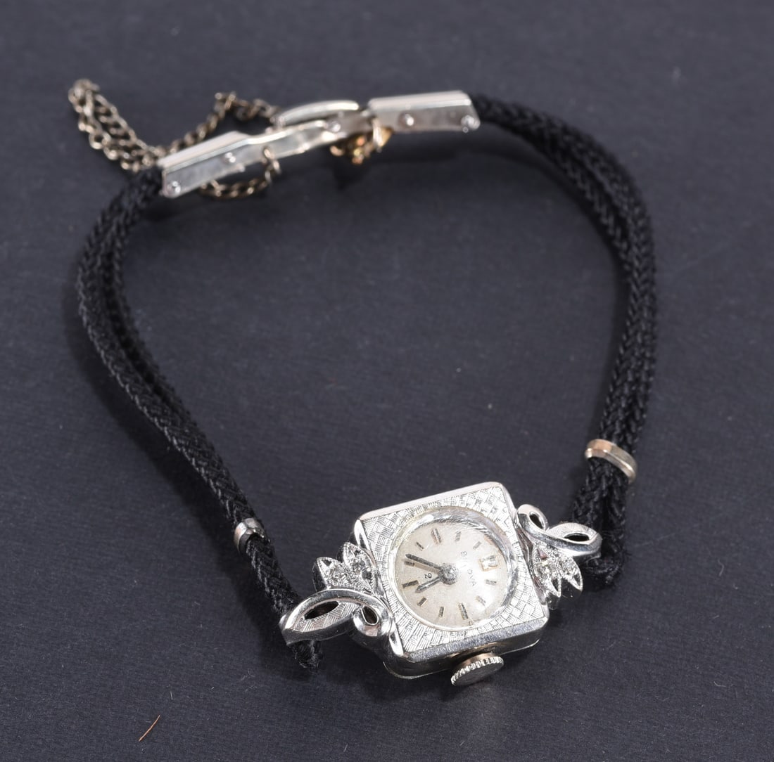 Bulova 10k R.G.P. ladies watch white gold color - black cloth band. Gold Fill (1 of 2)