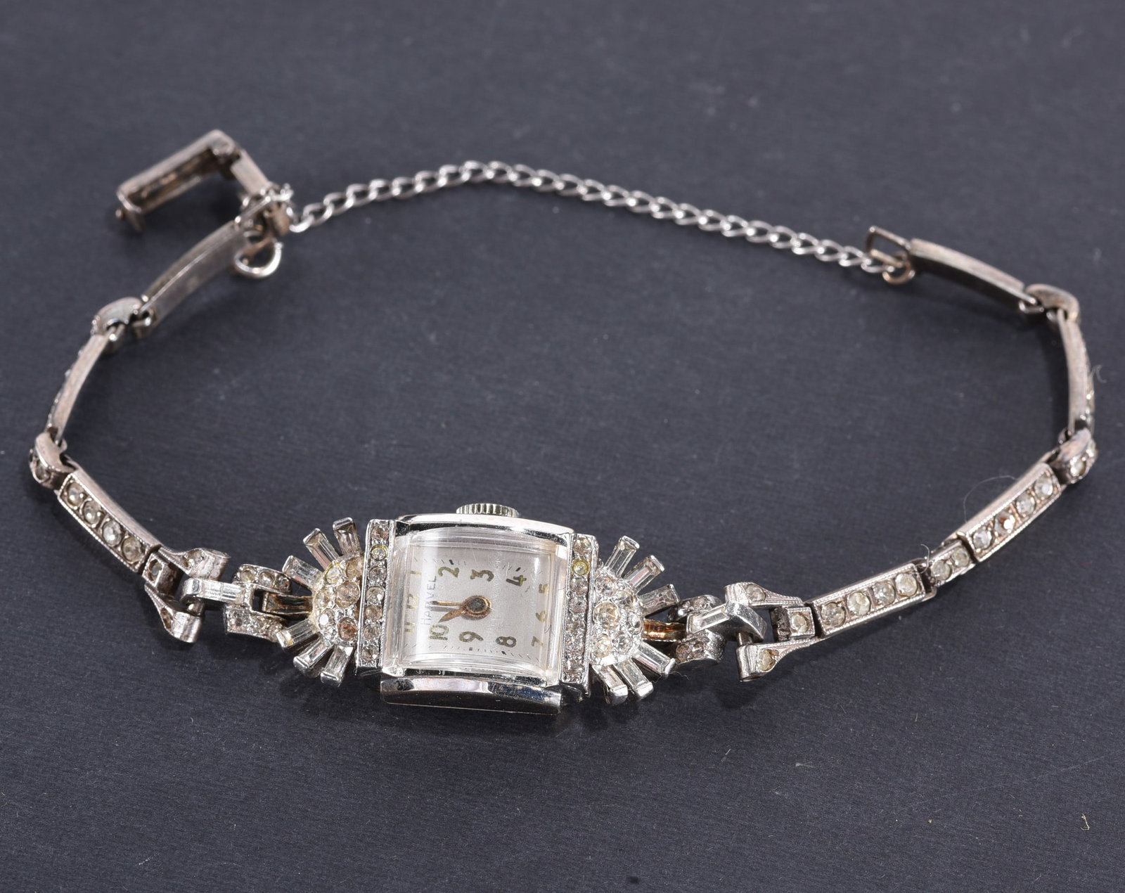 Harvel ladies quartz watch. Unmarked case. Sterling Silver band with rhinestones.: Harvel ladies quartz watch. Unmarked case. Sterling Silver band with rhinestones.