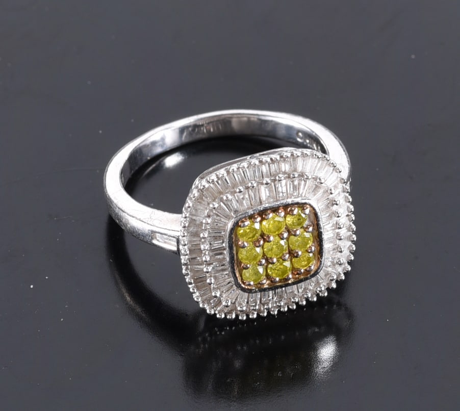Sterling Silver ring with 9 yellow diamonds. Stone square and two rows diamond baguettes halo.: Sterling Silver ring with 9 yellow diamonds. Stone square and two rows diamond baguettes halo. Joseph Schmid . Ring. Size 7