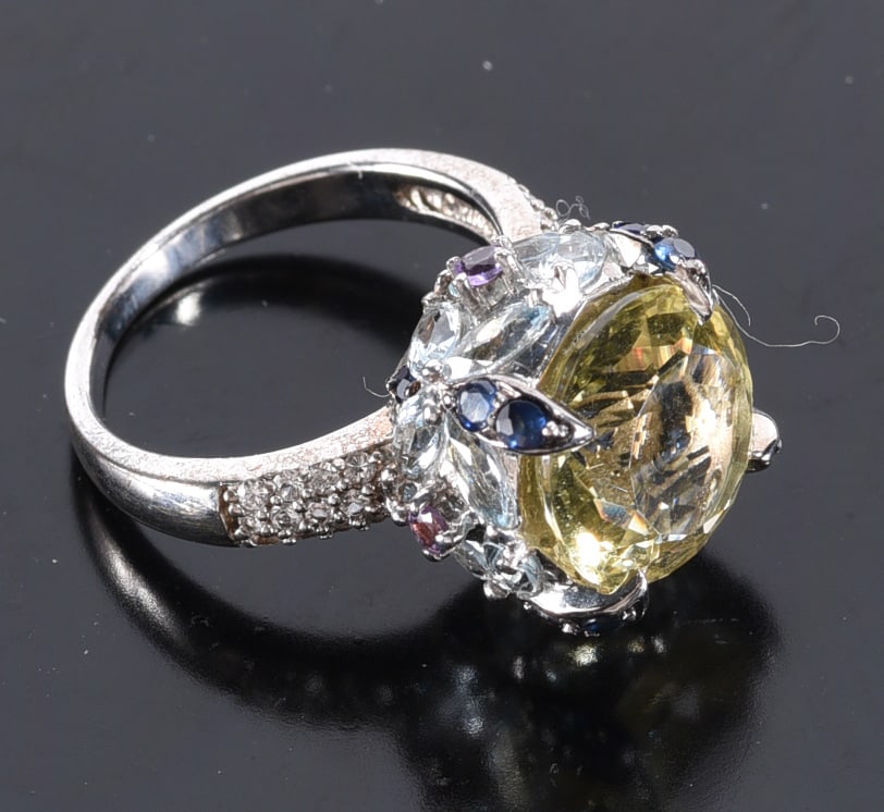 Sterling Silver lemon quartz with light blue on four sides and black prong stones. Ring. Size 6-3/4: Sterling Silver lemon quartz with light blue on four sides and black prong stones. Ring. Size 6-3/4