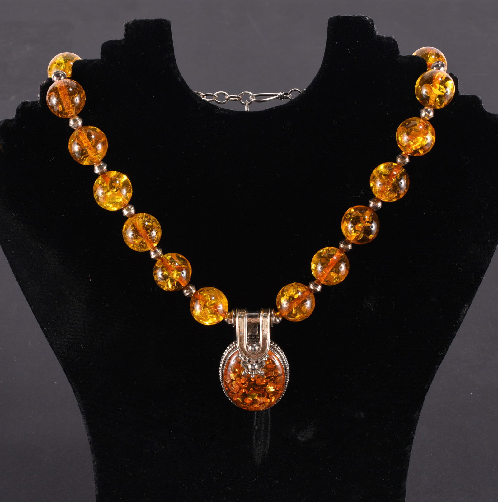 Formed amber bead necklace with oval Sterling Silver and amber pendant. 16" (1 of 2)