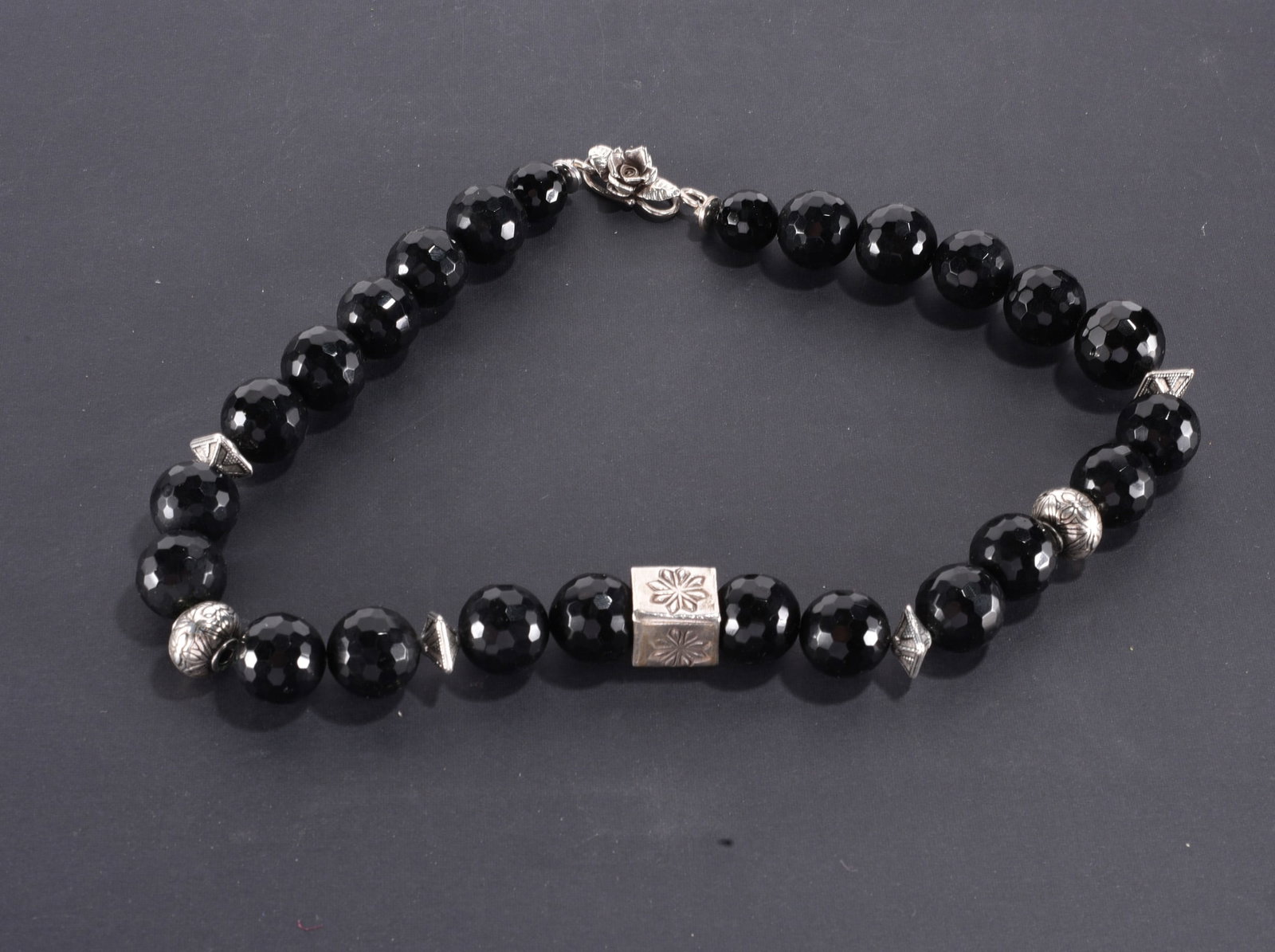 Artisan strung large black faced bead necklace with silver accent beads. 20" - 195.4 grams: Artisan strung large black faced bead necklace with silver accent beads. 20" - 195.4 grams